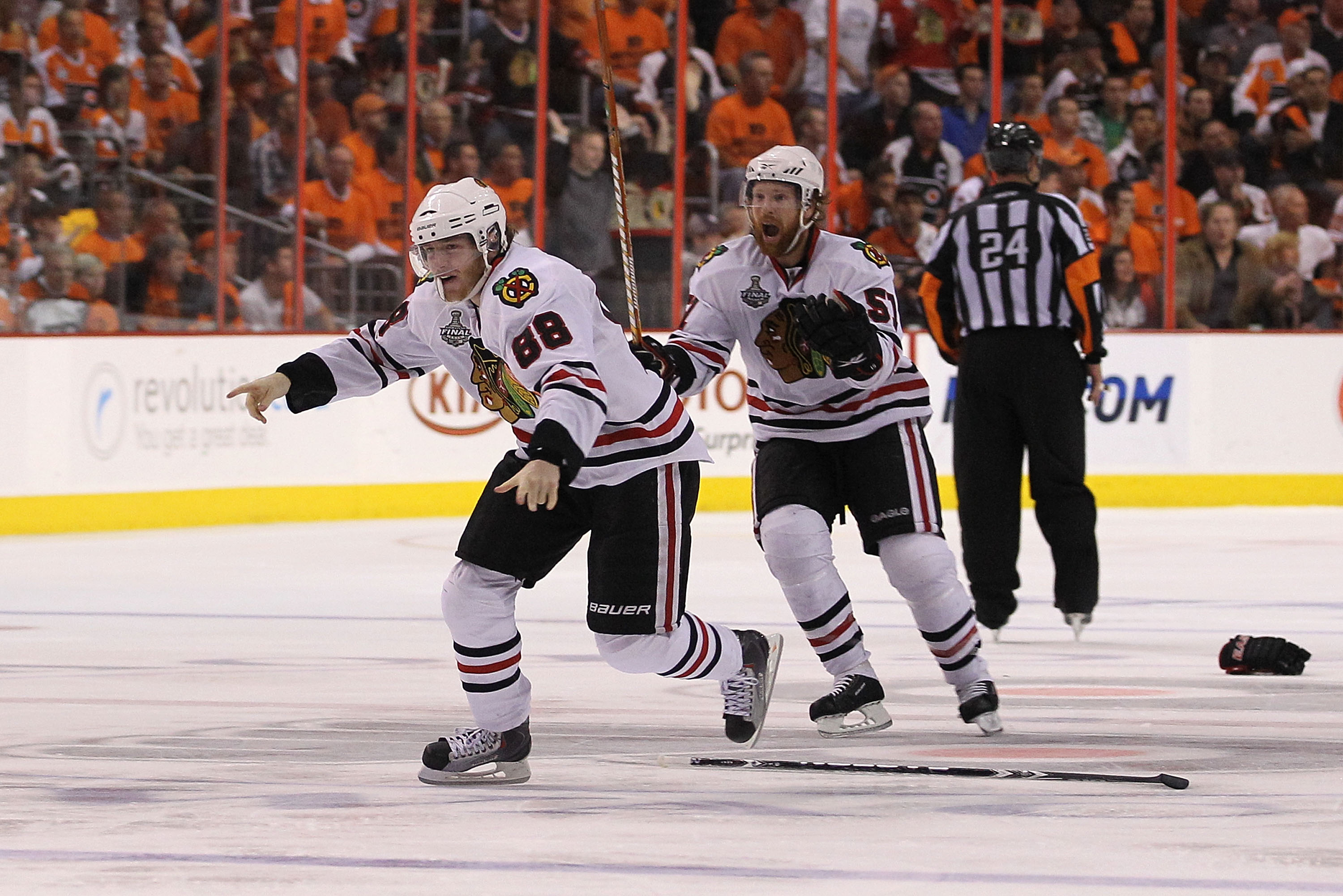 PHILADELPHIA - JUNE 09:  Patrick Kane #88 of the Chicago Blackhawks celebrates with teammate Brian Campbell #51 after scoring the game-winning goal in overtime to defeat the Philadelphia Flyers 4-3 and win the Stanley Cup in Game Six of the 2010 NHL Stanl