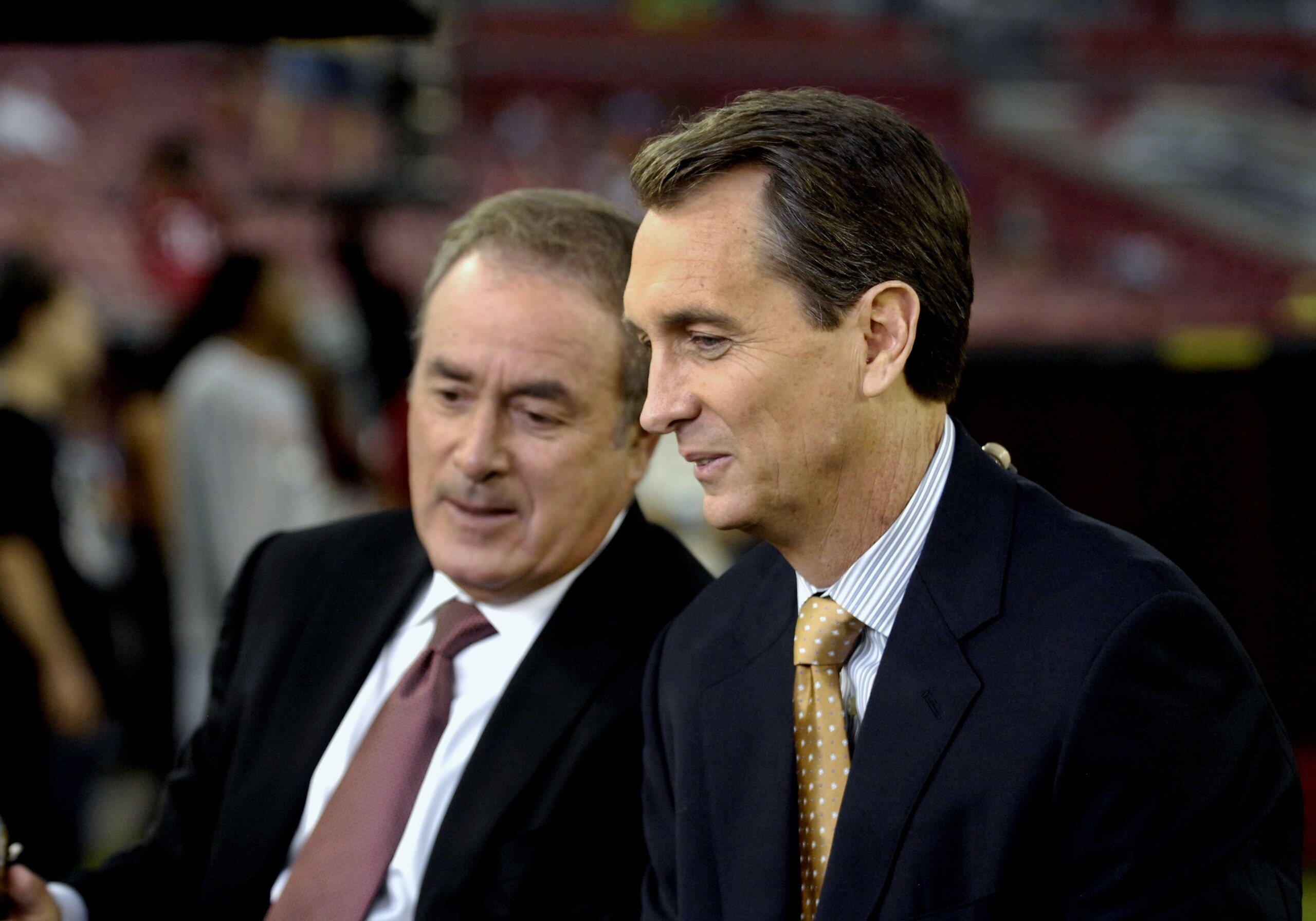 TAMPA, FL - OCTOBER 19: NBC commentators Cris Collinsworth and Al Michaels reports from the sidelines as the Tampa Bay Buccaneers host the Seattle Seahawks at Raymond James Stadium on October 19, 2008 in Tampa, Florida.  (Photo by Al Messerschmidt/Getty I