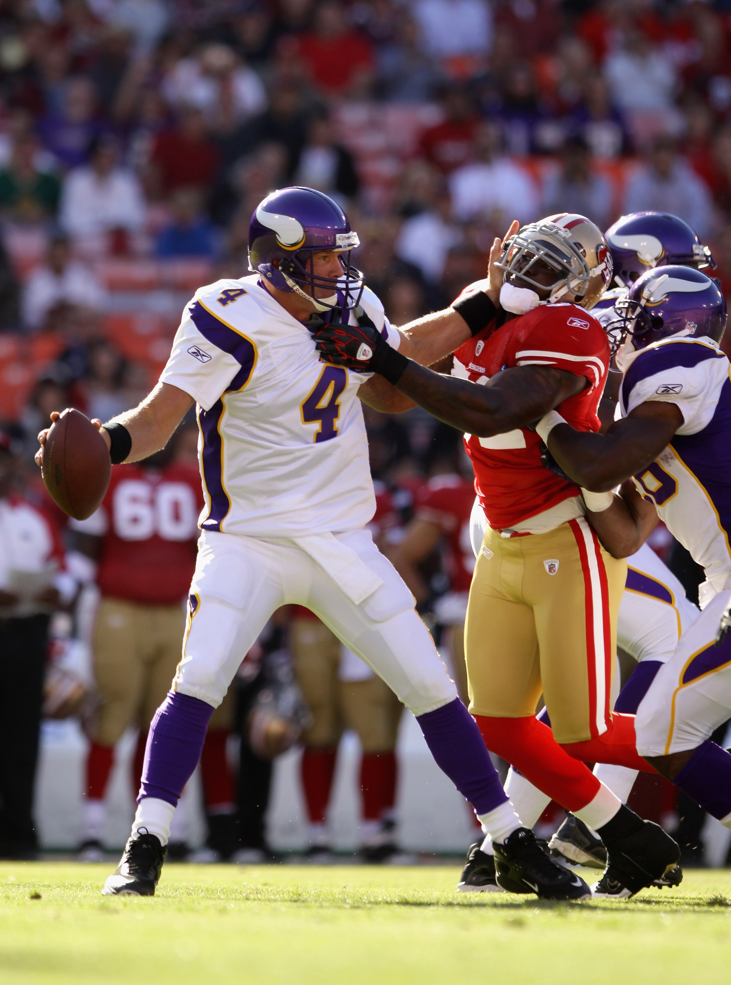 SAN FRANCISCO - AUGUST 22:  Brett Favre #4 of the Minnesota Vikings is sacked by Patrick Willis #52 of the San Francisco 49ers during a preseason game at Candlestick Park on August 22, 2010 in San Francisco, California.  (Photo by Ezra Shaw/Getty Images)