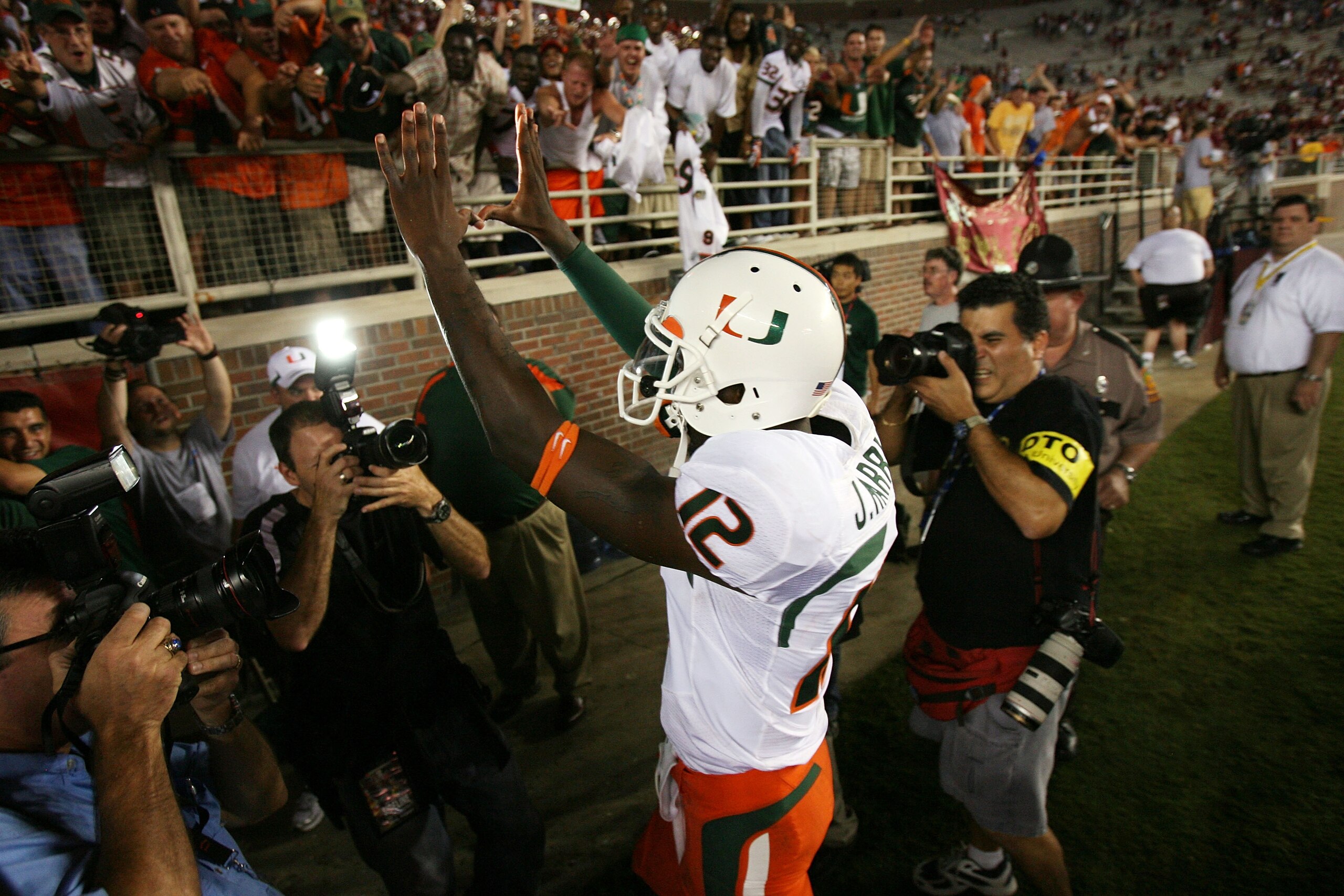 TALLAHASSEE, FL - SEPTEMBER 07:  Quarterback Jacory Harris #12 of the Miami Hurricanes celebrates victory over the Florida State Seminoles as he leaves the field at Doak Campbell Stadium on September 7, 2009 in Tallahassee, Florida. Miami defeated Florida
