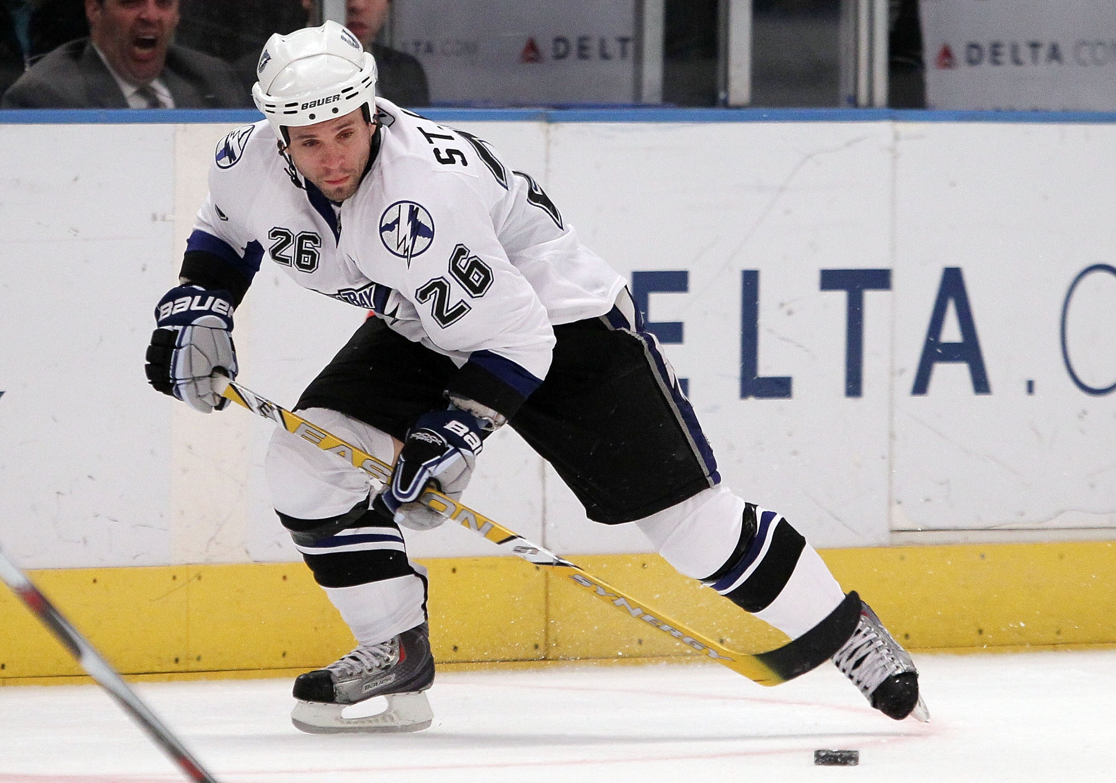 NEW YORK - JANUARY 19: Martin St. Louis #26 of the Tampa Bay Lightning skates against the New York Rangers on January 19, 2010 at Madison Square Garden in New York City. (Photo by Jim McIsaac/Getty Images) NEW YORK - JANUARY 19: Martin St. Louis #26 of the Tampa Bay Lightning skates against the New York Rangers on January 19, 2010 at Madison Square Garden in New York City. (Photo by Jim McIsaac/Getty Images)
