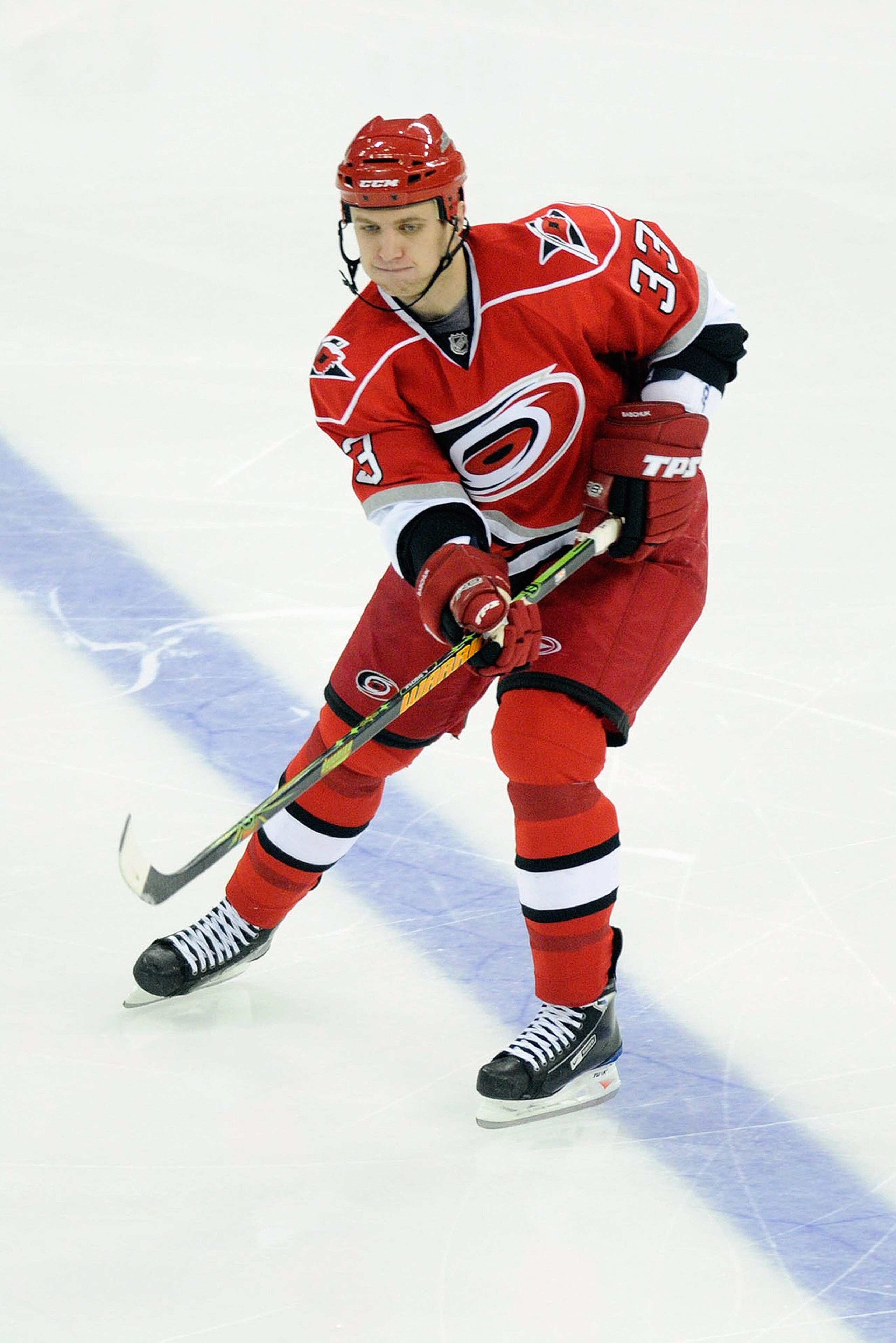 RALEIGH, NC - MARCH 18:  Anton Babchuk #33 of the Carolina Hurricanes skates against the New Jersey Devils during the game at RBC Center on March 18, 2009 in Raleigh, North Carolina. (Photo by Grant Halverson/Getty Images)