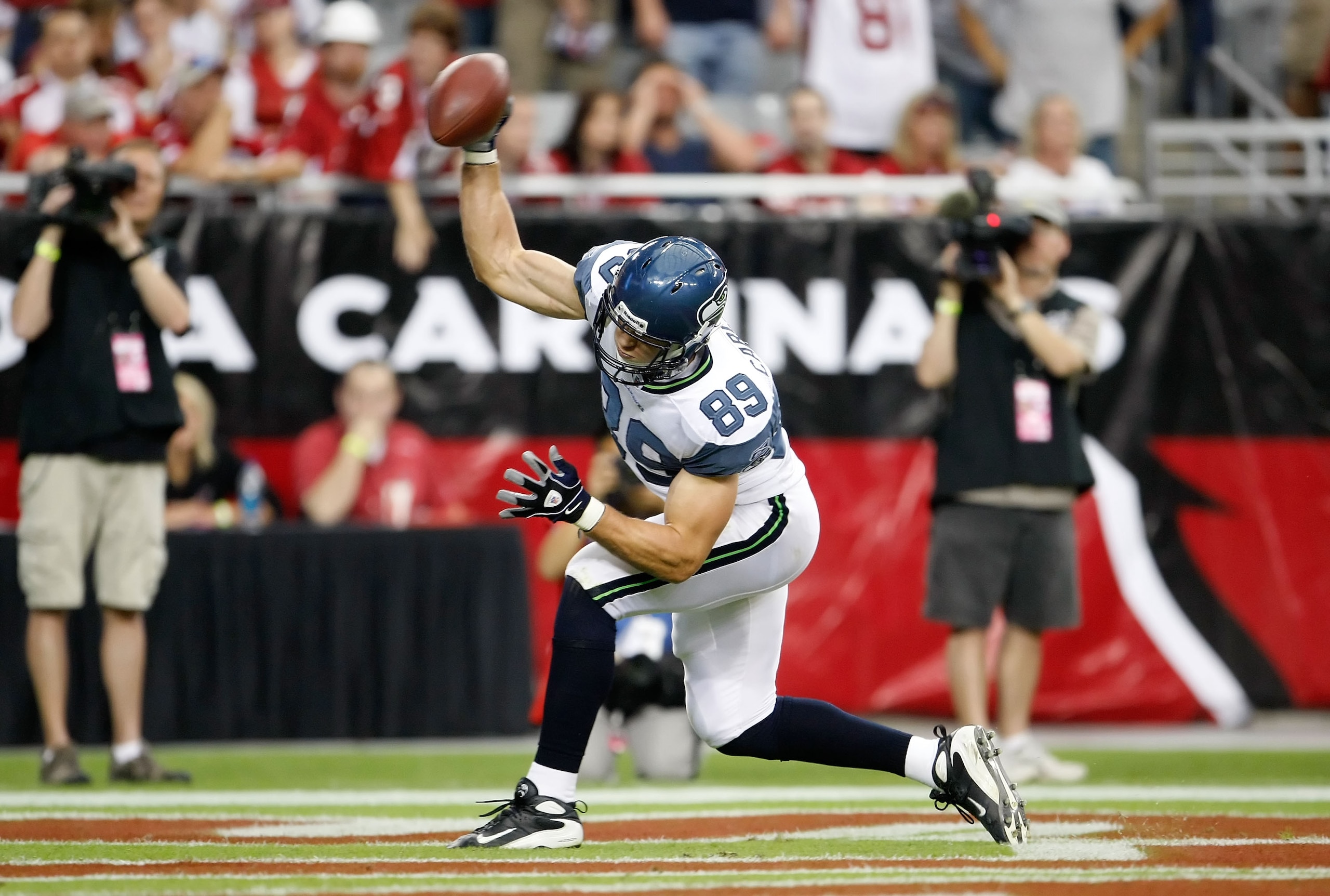 GLENDALE, AZ - NOVEMBER 15:  John Carlson #89 of the Seattle Seahawks celebrates a touchdown by spiking the ball in the first half against the Arizona Cardinals at University of Phoenix Stadium on November 15, 2009 in Glendale, Arizona.  (Photo by Jeff Gr