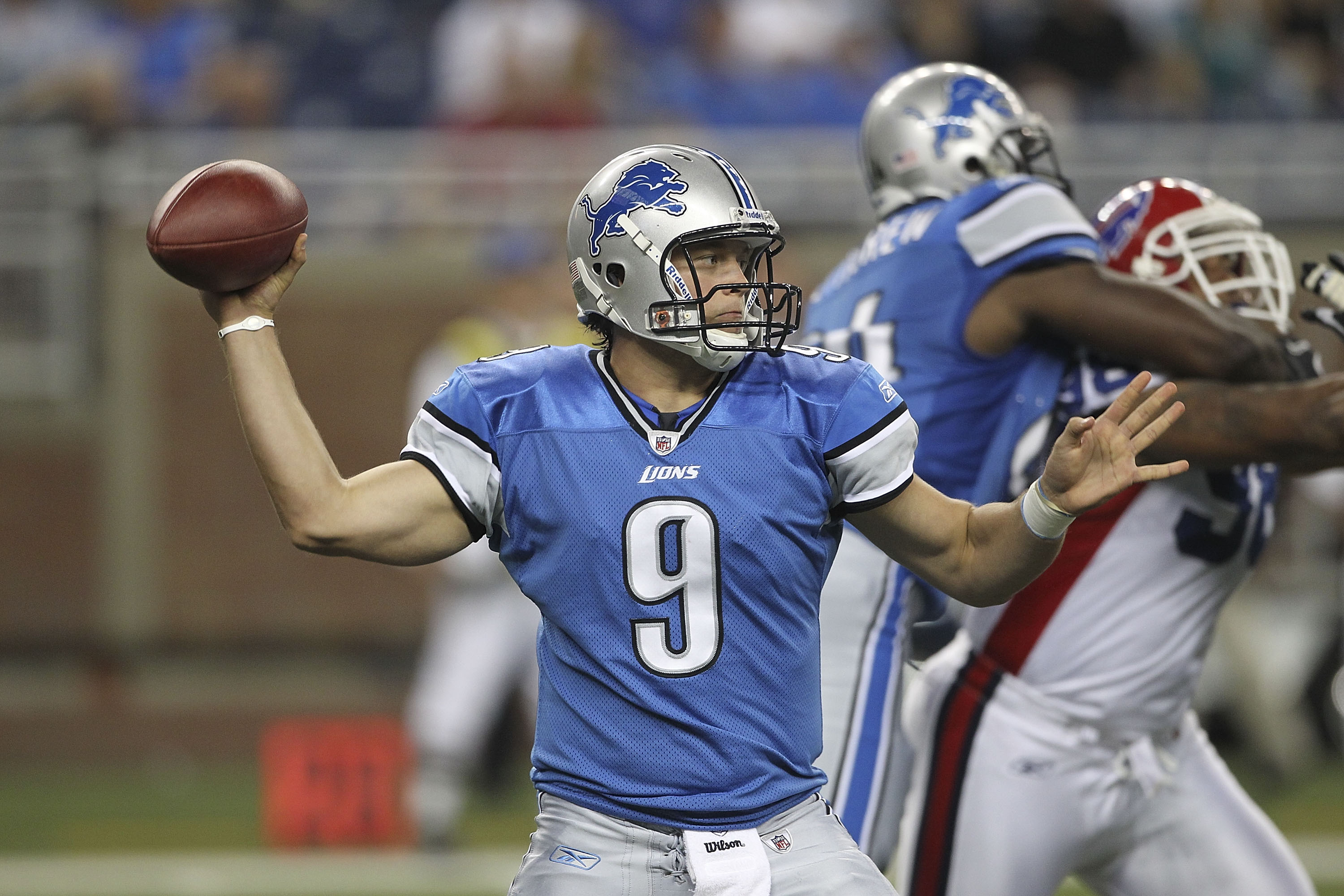 DETROIT - SEPTEMBER 02:  Matthew Stafford #9 of the Detroit Lions drops back to pass in the first quarter of the preseason game against the Buffalo Bills at Ford Field on September 2, 2010 in Detroit, Michigan.  (Photo by Leon Halip/Getty Images)