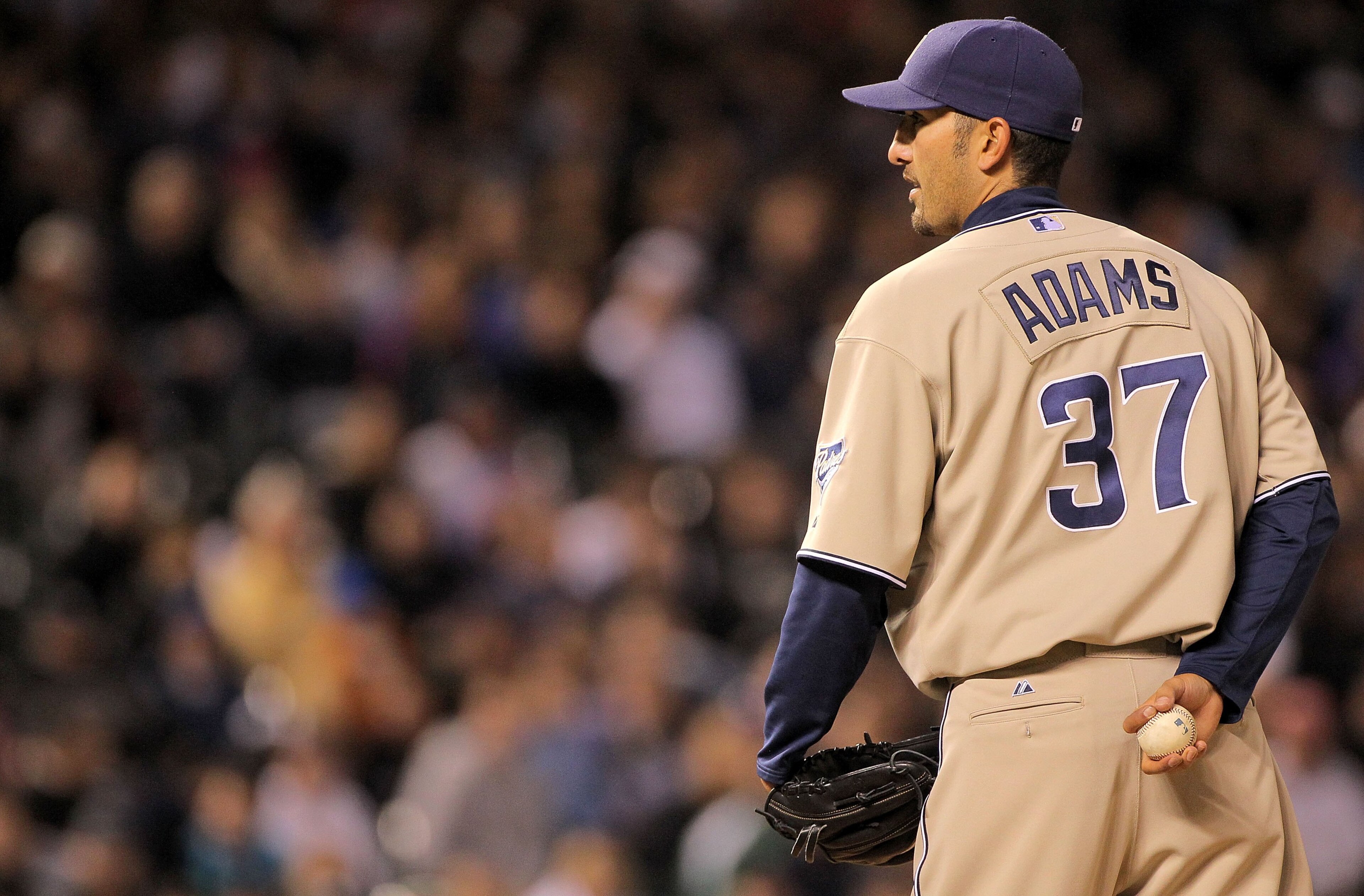 DENVER - APRIL 10:  Relief pitcher Mike Adams #37 of the San Diego Padres delivers against the Colorado Rockies during MLB action at Coors Field on April 10, 2010 in Denver, Colorado. The Padres defeated the Rockies 5-4 in 14 innings.  (Photo by Doug Pens