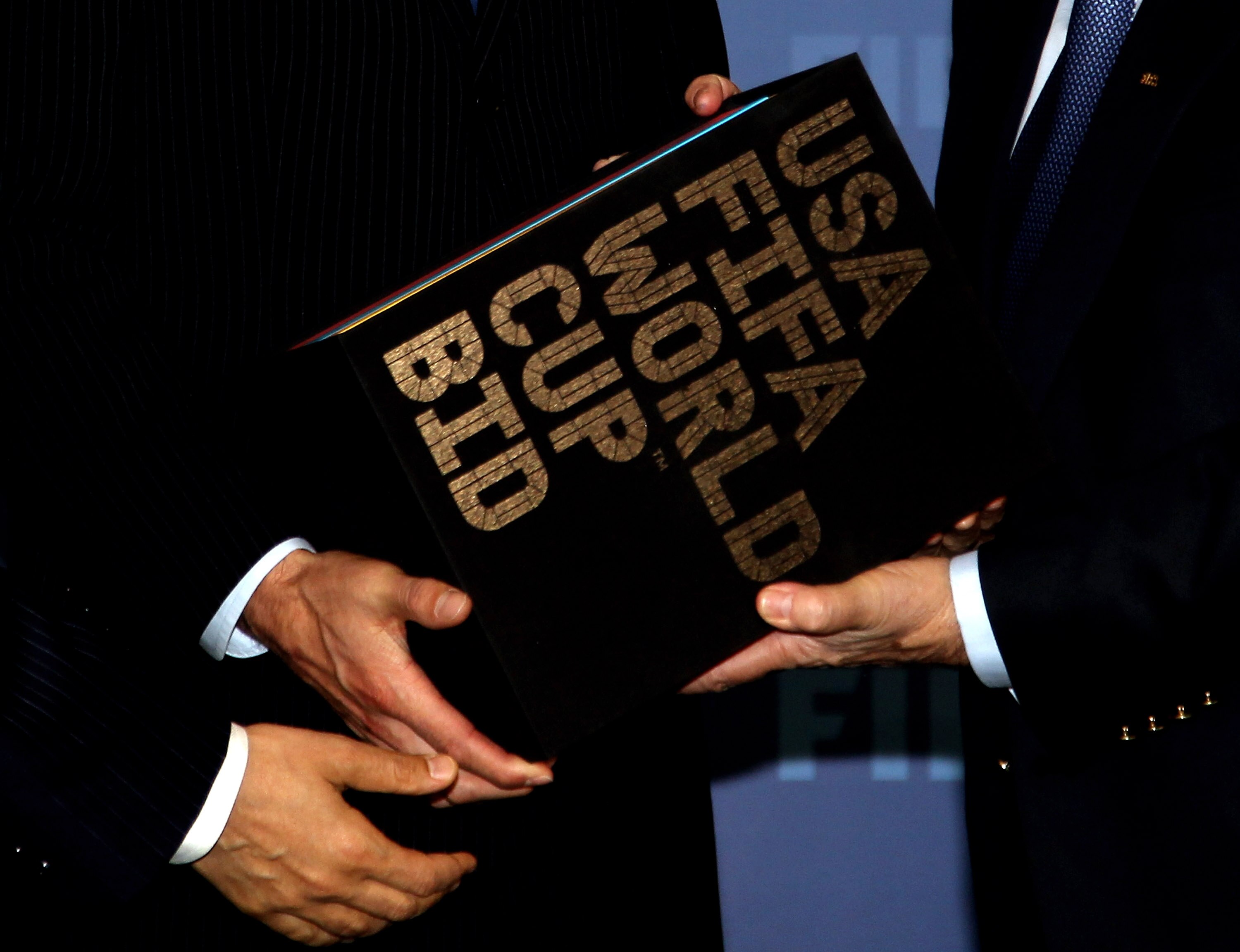 ZURICH, SWITZERLAND - MAY 14:  Sunil Gulati, President USSF and Chairman USA Bid Committee and Carlos Bocanerga, Captain Menï¿½s Nation Team present Sepp Blatter, FIFA President with their Bid Book during the 2018/2022 World Cup Bid Book Handover ceremony a