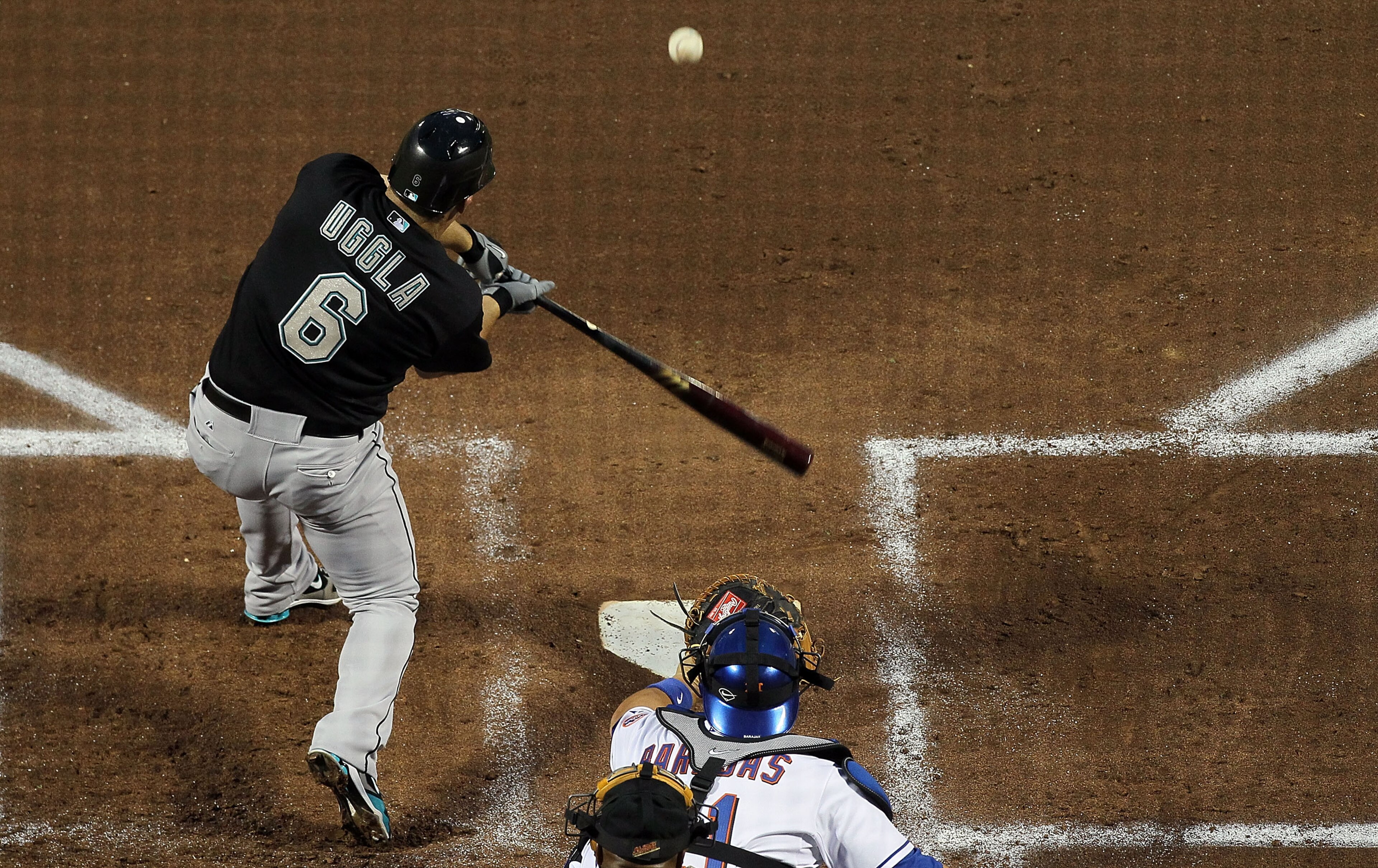 NEW YORK - APRIL 07: Dan Uggla #6 of the Florida Marlins connects on a first inning base hit against the New York Mets on April 7, 2010 at Citi Field in the Flushing neighborhood of the Queens borough of New York City. (Photo by Jim McIsaac/Getty Images NEW YORK - APRIL 07: Dan Uggla #6 of the Florida Marlins connects on a first inning base hit against the New York Mets on April 7, 2010 at Citi Field in the Flushing neighborhood of the Queens borough of New York City. (Photo by Jim McIsaac/Getty Images