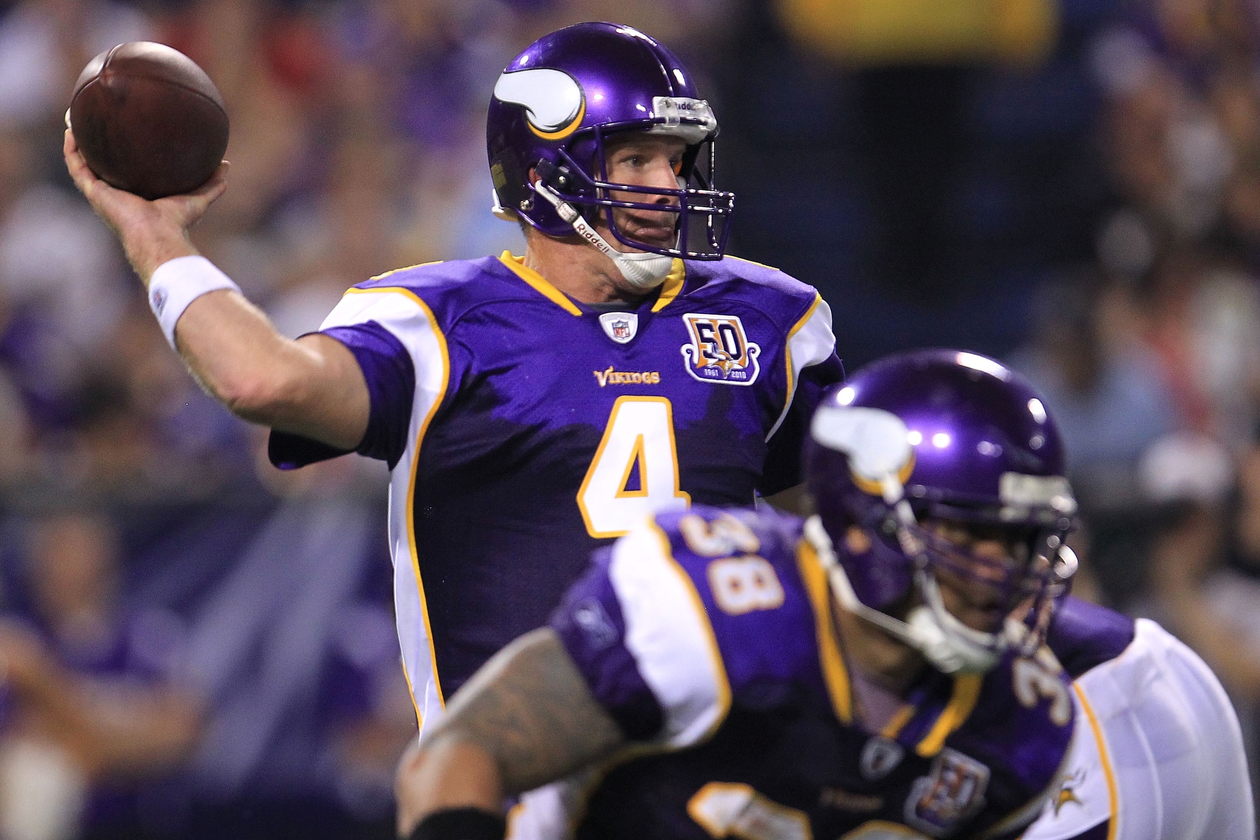 MINNEAPOLIS - AUGUST 28:  Brett Favre #4 of the Minnesota Vikings looks to pass against the Seattle Seahawks during a preseason NFL game at Mall of America Field at the Hubert H. Humphrey Metrodome on August 28, 2010  in Minneapolis, Minnesota.  (Photo by