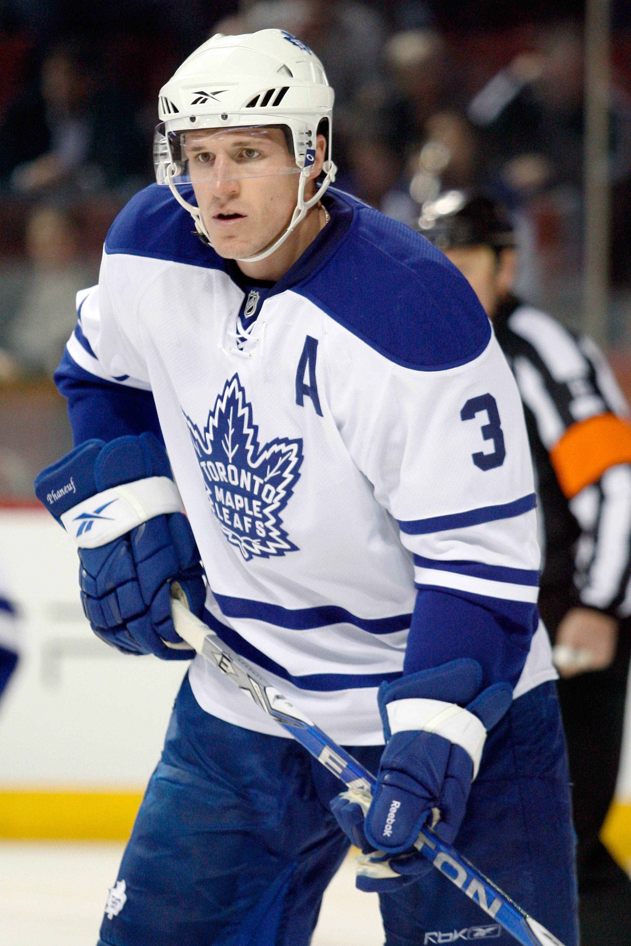 MONTREAL- APRIL 10:  Dion Phaneuf #3 of the Toronto Maple Leafs watches play during the NHL game against the Montreal Canadiens on April 10, 2010 at the Bell Centre in Montreal, Quebec, Canada.  The Maple Leafs defeated the Canadiens 4-3 in overtime.  (Ph