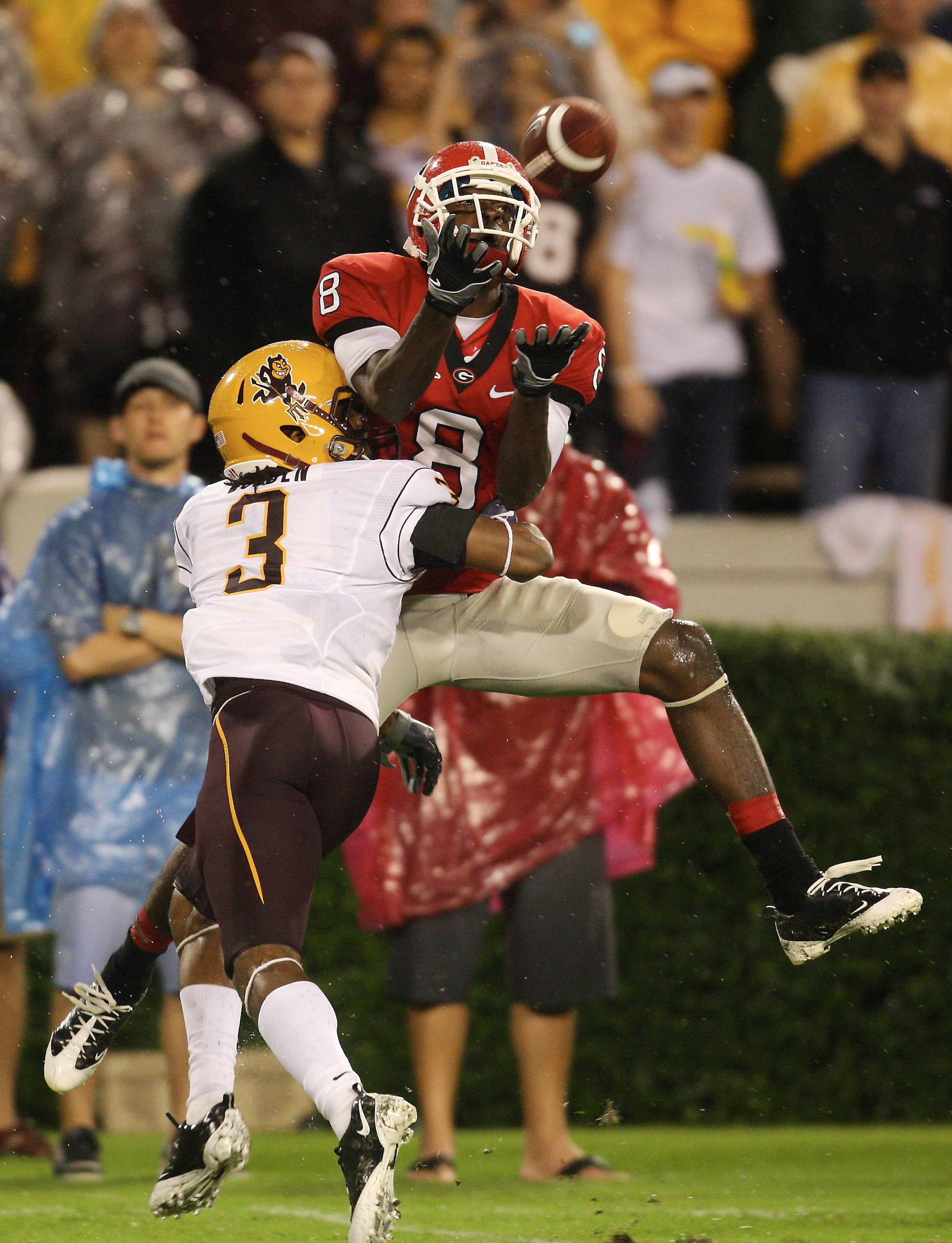 ATHENS, GA - SEPTEMBER 26: A. J. Green #8 of the Georgia Bulldogs goes up for a pass against Omar Bolden #3 of the Arizona State Sun Devils at Sanford Stadium on September 26, 2009 in Athens, Georgia. (Photo by Scott Cunningham/Getty Images) ATHENS, GA - SEPTEMBER 26: A. J. Green #8 of the Georgia Bulldogs goes up for a pass against Omar Bolden #3 of the Arizona State Sun Devils at Sanford Stadium on September 26, 2009 in Athens, Georgia. (Photo by Scott Cunningham/Getty Images)