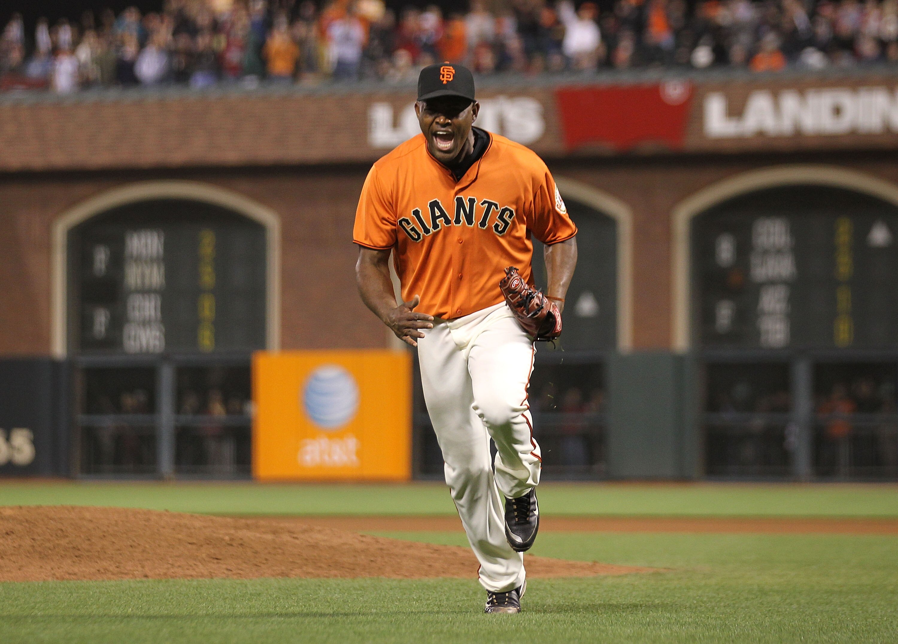 SAN FRANCISCO - JUNE 25: Santiago Casilla #46 of the San Francisco Giants celebrates after striking out Victor Martinez of the Boston Red Sox with the bases loaded in the seventh inning during an MLB game at AT&T Park on June 25, 2010 in San Francisco, Ca