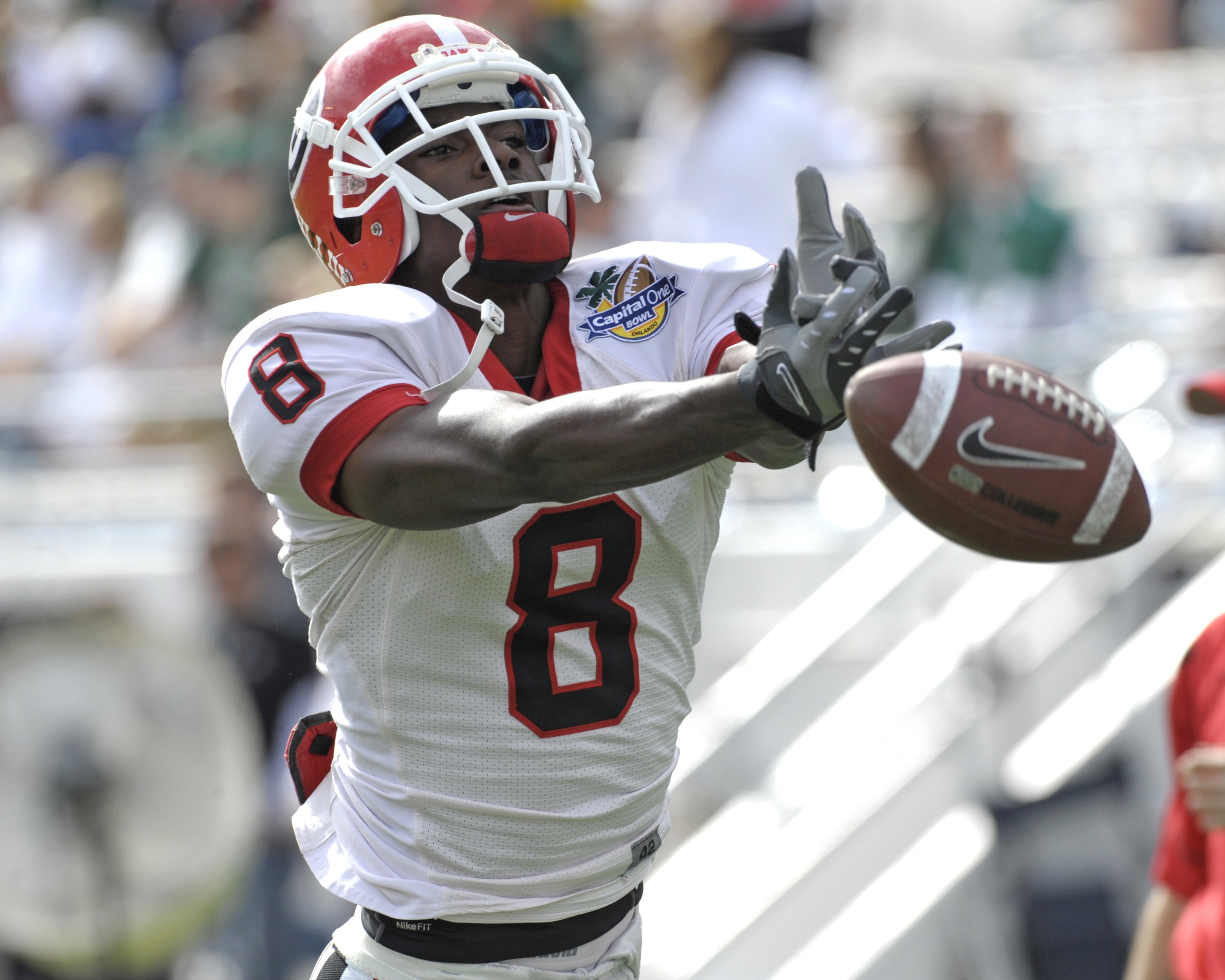 ORLANDO, FL - JANUARY 1: Flanker A. J. Green #8 of the University of Georgia warms up for play against the Michigan State Spartans at the 2009 Capital One Bowl at the Citrus Bowl on January 1, 2009 in Orlando, Florida.  (Photo by Al Messerschmidt/Getty Im