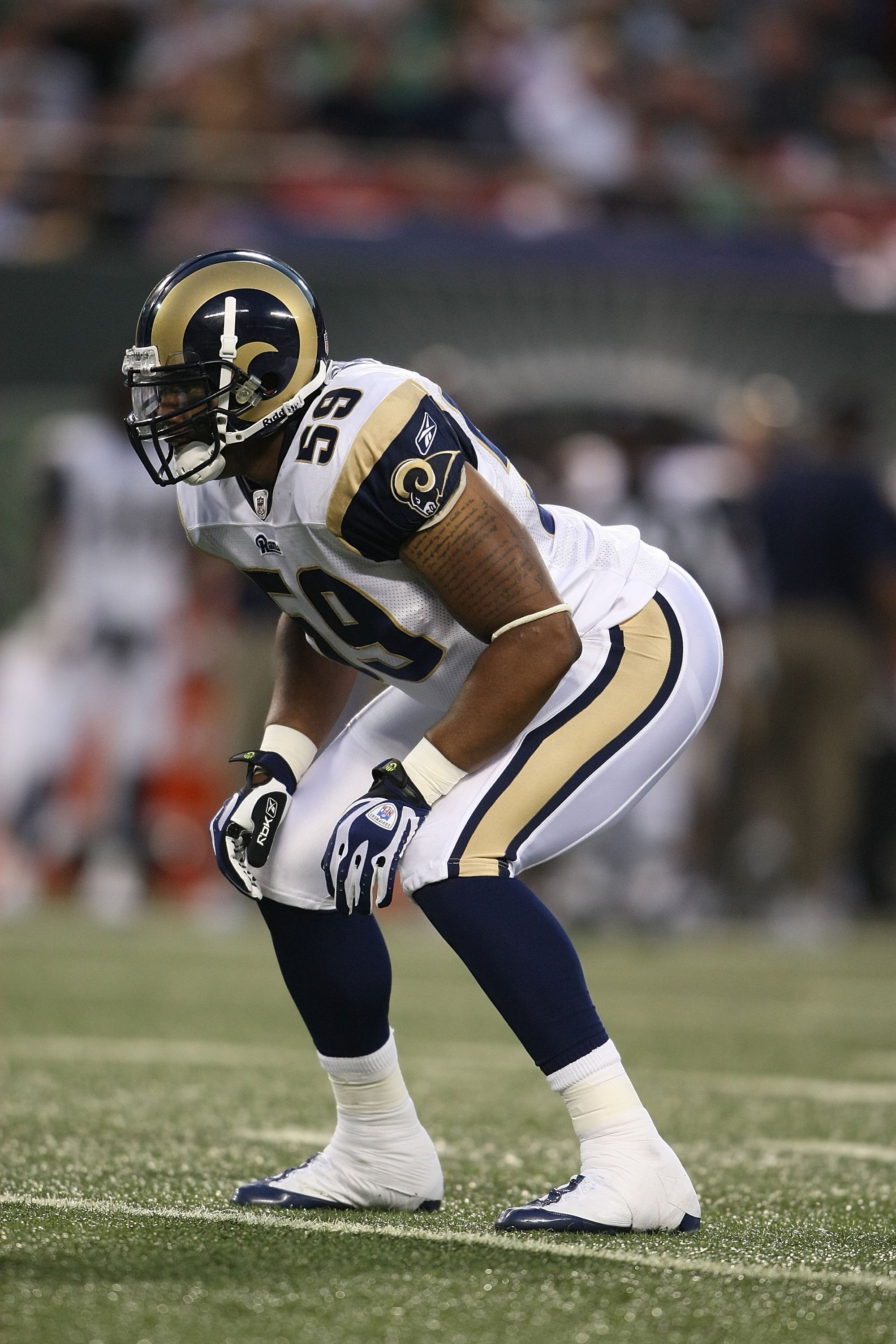 EAST RUTHERFORD, NJ - AUGUST 14: Larry Grant #59 of the St. Louis Rams waits for the snap against the New York Jets during their preseason game at Giants Stadium on August 14, 2009  in East Rutherford, New Jersey.  (Photo by Nick Laham/Getty Images)