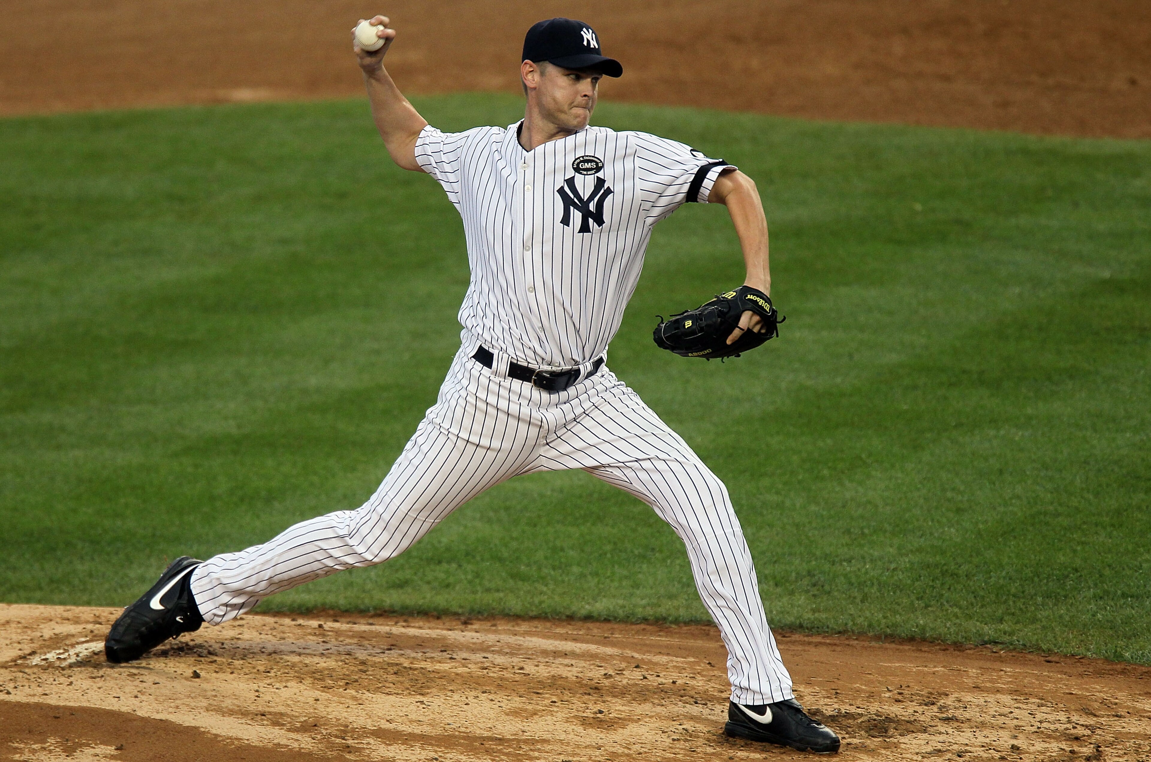 NEW YORK - AUGUST 22: Kerry Wood #39 of the New York Yankees pitches against the Seattle Mariners on August 22, 2010 at Yankee Stadium in the Bronx borough of New York City.The Yankees defeated the Mariners 10-0. (Photo by Jim McIsaac/Getty Images) NEW YORK - AUGUST 22: Kerry Wood #39 of the New York Yankees pitches against the Seattle Mariners on August 22, 2010 at Yankee Stadium in the Bronx borough of New York City.The Yankees defeated the Mariners 10-0. (Photo by Jim McIsaac/Getty Images)