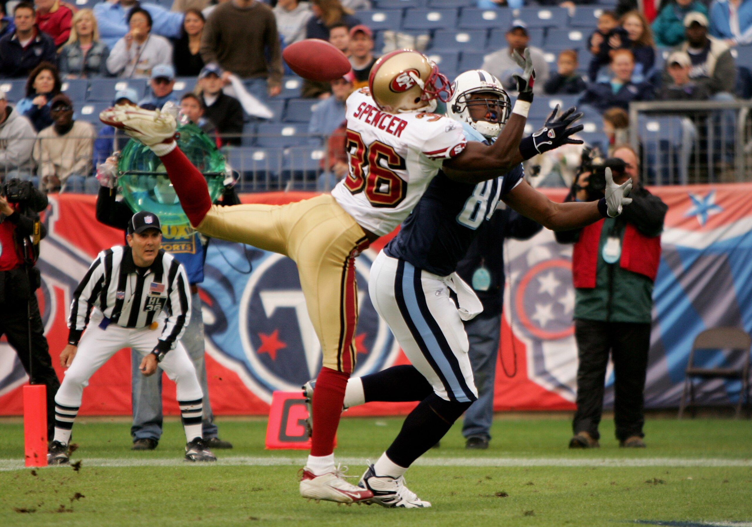 NASHVILLE, TN - NOVEMBER 27: Shawntee Spencer #36 of the San Francisco 49ers breaks up a pass in the end zone intended for Erron Kinney #88 of the Tennessee Titans during week 12 NFL action on November 27, 2005 at the Coliseum in Nashville, Tennessee.  (P