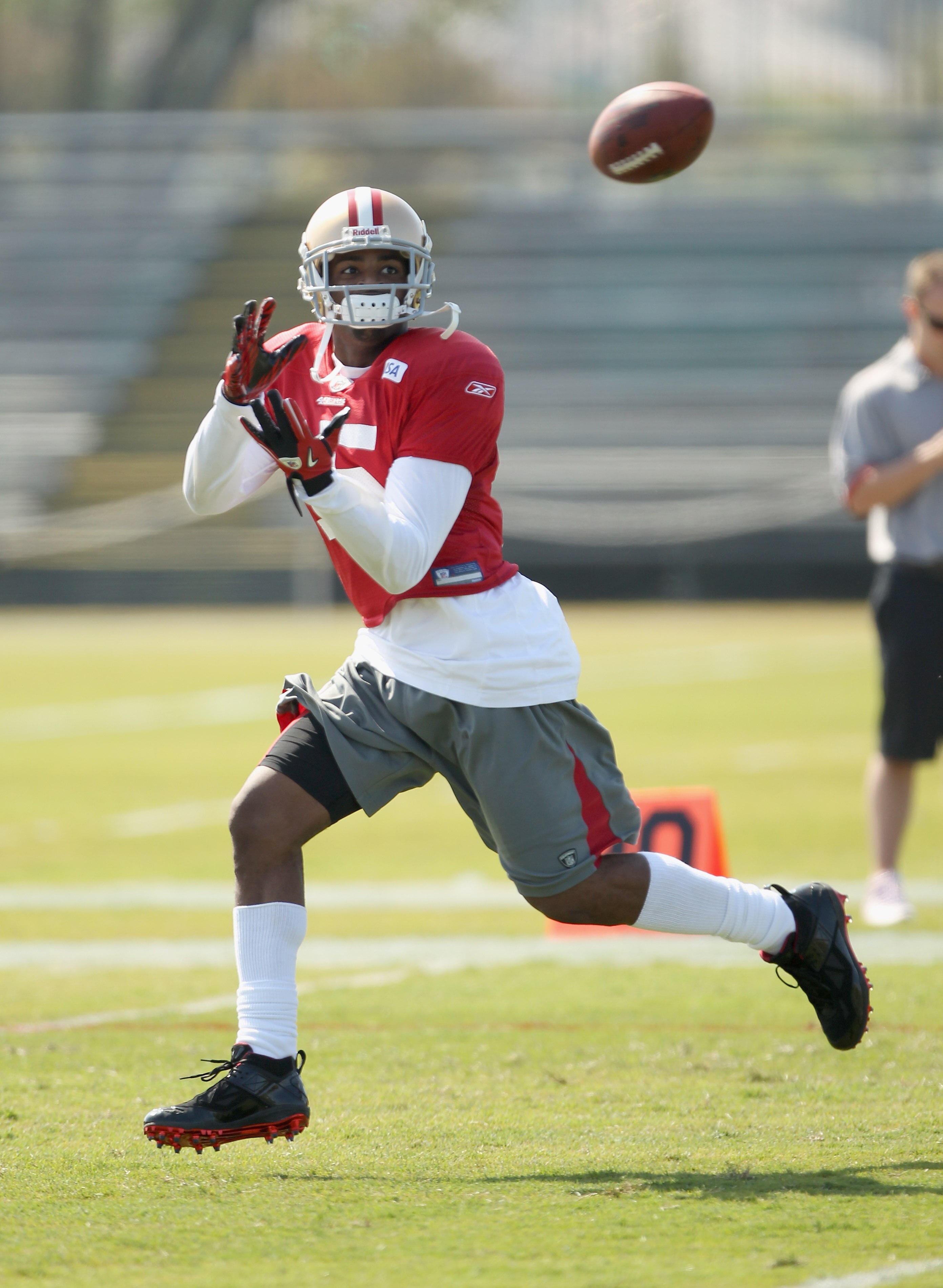 SANTA CLARA, CA - AUGUST 02: Michael Crabtree #15 works out during the San Francisco 49ers training camp at their training complex on August 2, 2010 in Santa Clara, California. (Photo by Ezra Shaw/Getty Images) SANTA CLARA, CA - AUGUST 02: Michael Crabtree #15 works out during the San Francisco 49ers training camp at their training complex on August 2, 2010 in Santa Clara, California. (Photo by Ezra Shaw/Getty Images)