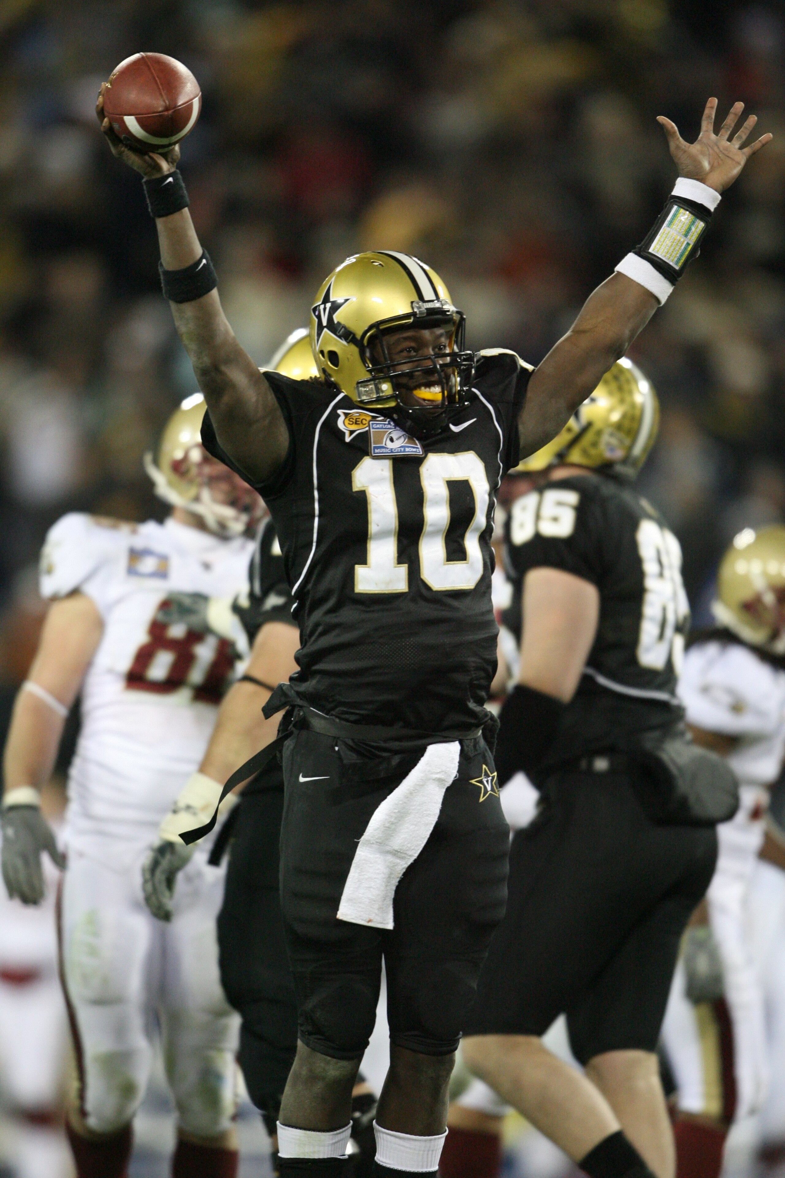 NASHVILLE, TN - DECEMBER 31: Larry Smith #10 of the Vanderbilt Commodores celebrates against the Boston College Eagles during the Gaylord Hotels Music City Bowl at LP Field on December 31, 2008 in Nashville, Tennessee. (Photo by Andy Lyons/Getty Images) NASHVILLE, TN - DECEMBER 31: Larry Smith #10 of the Vanderbilt Commodores celebrates against the Boston College Eagles during the Gaylord Hotels Music City Bowl at LP Field on December 31, 2008 in Nashville, Tennessee. (Photo by Andy Lyons/Getty Images)
