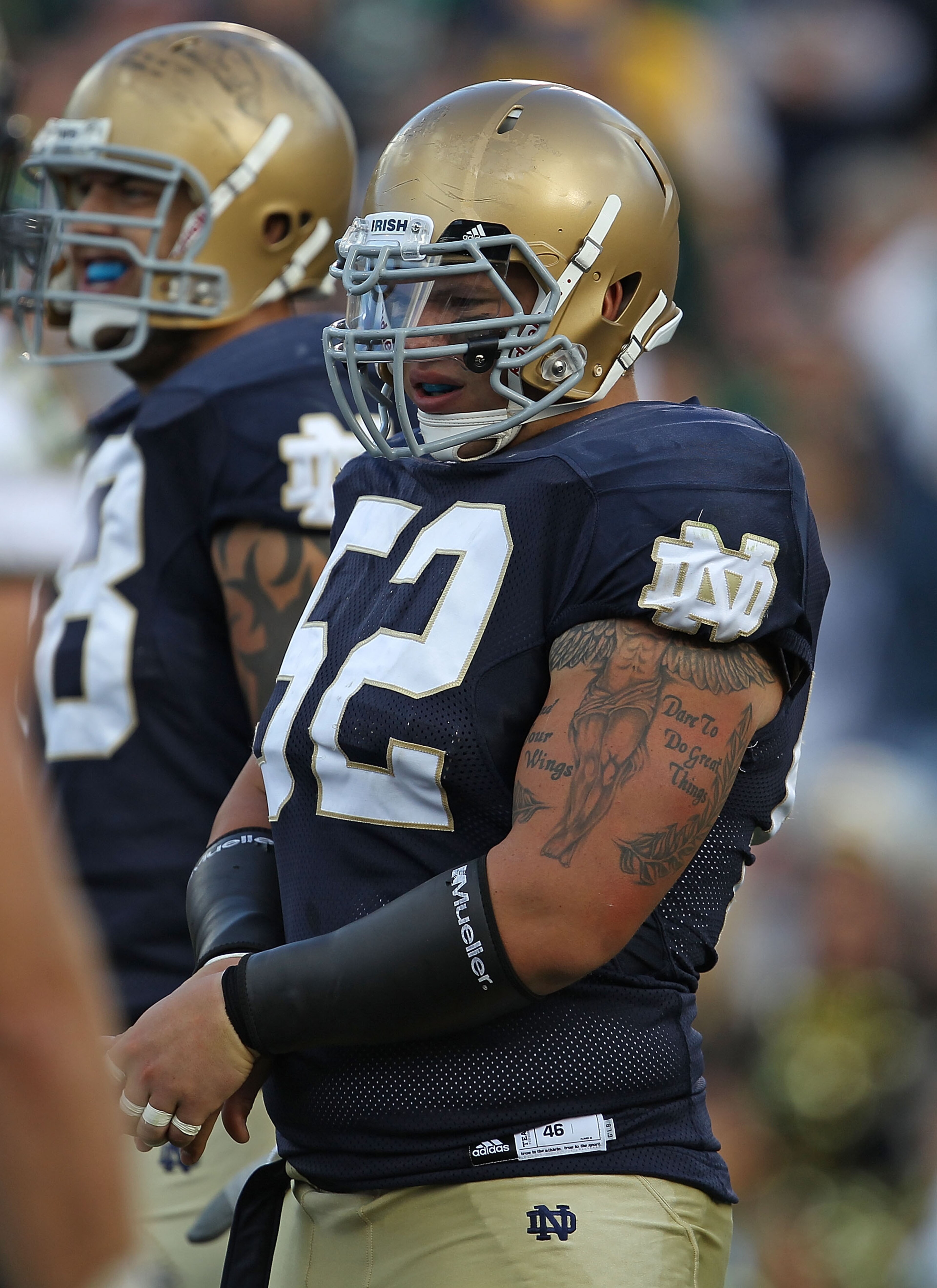 SOUTH BEND, IN - SEPTEMBER 04: Braxston Cave #52 of the Notre Dame Fighting Irish awaits the start of play against the Purdue Boilermakers at Notre Dame Stadium on September 4, 2010 in South Bend, Indiana. Notre Dame defeated Purdue 23-12. (Photo by Jonat