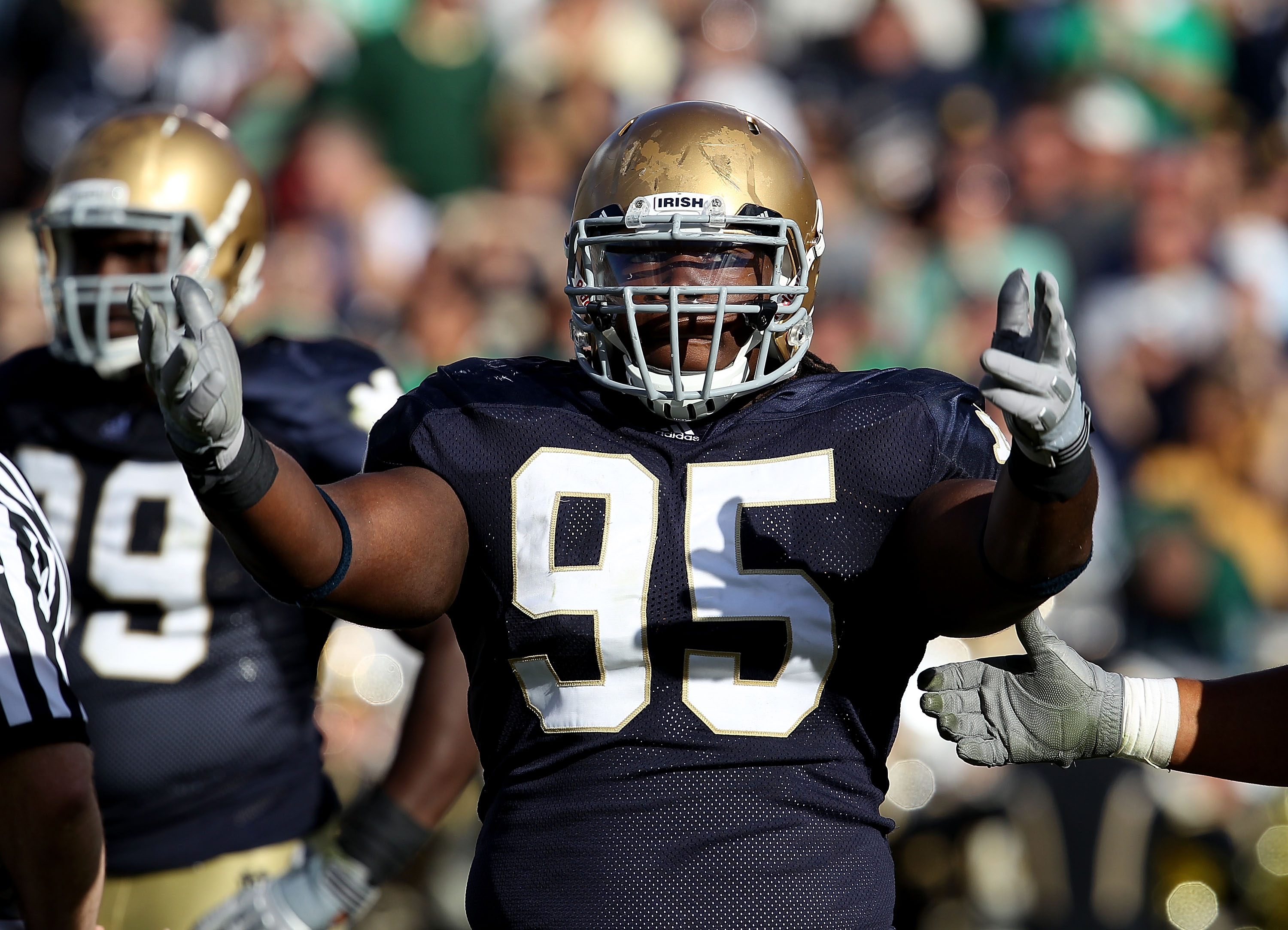 SOUTH BEND, IN - SEPTEMBER 04: Ian Williams #95 of the Notre Dame Fighting Irish encourages the crowd during a game against the Purdue Boilermakers at Notre Dame Stadium on September 4, 2010 in South Bend, Indiana. Notre Dame defeated Purdue 23-12. (Photo