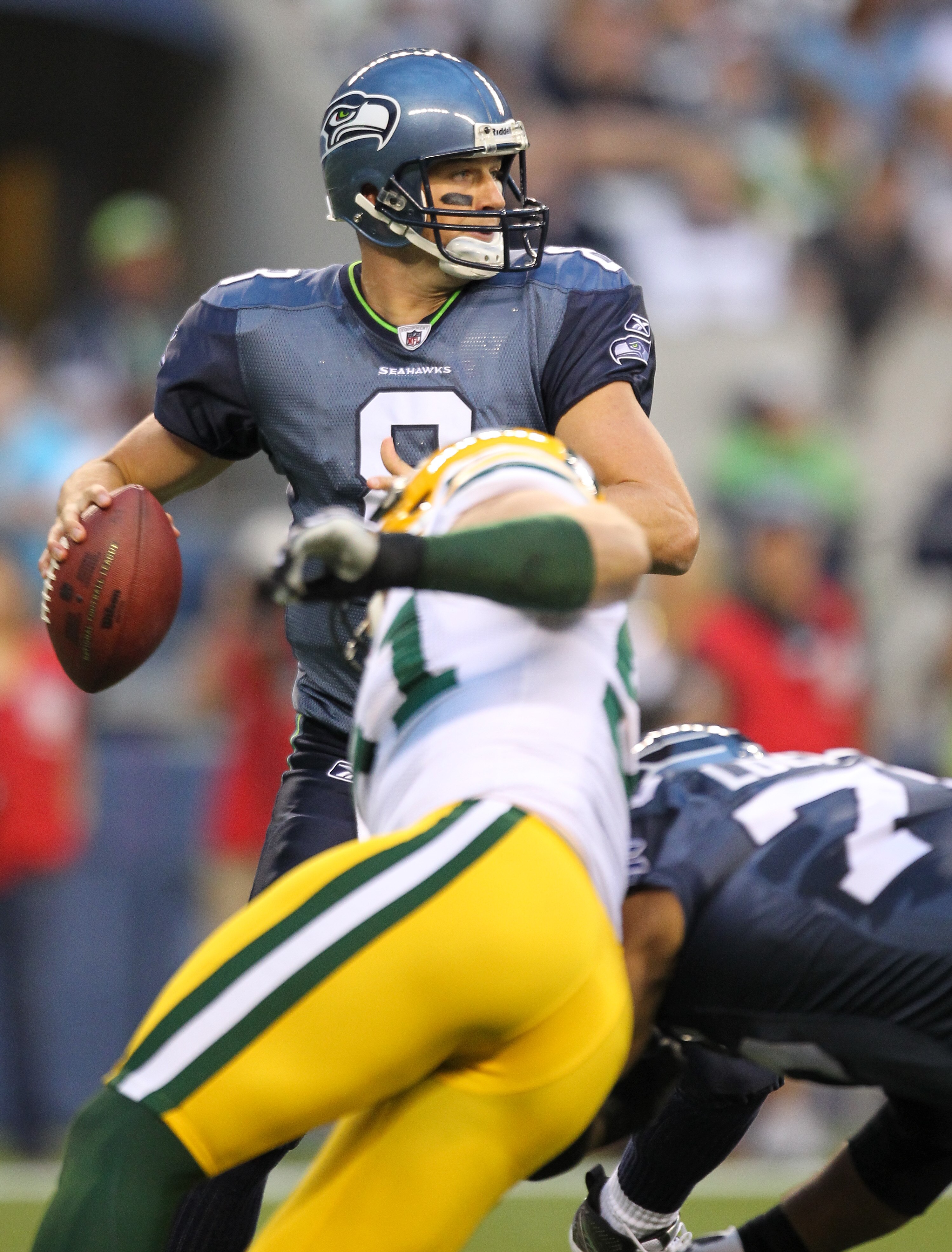 SEATTLE - AUGUST 21:  Quarterback Matt Hasselbeck #8 of the Seattle Seahawks looks downfield during the preseason game against the Green Bay Packers at Qwest Field on August 21, 2010 in Seattle, Washington. (Photo by Otto Greule Jr/Getty Images)
