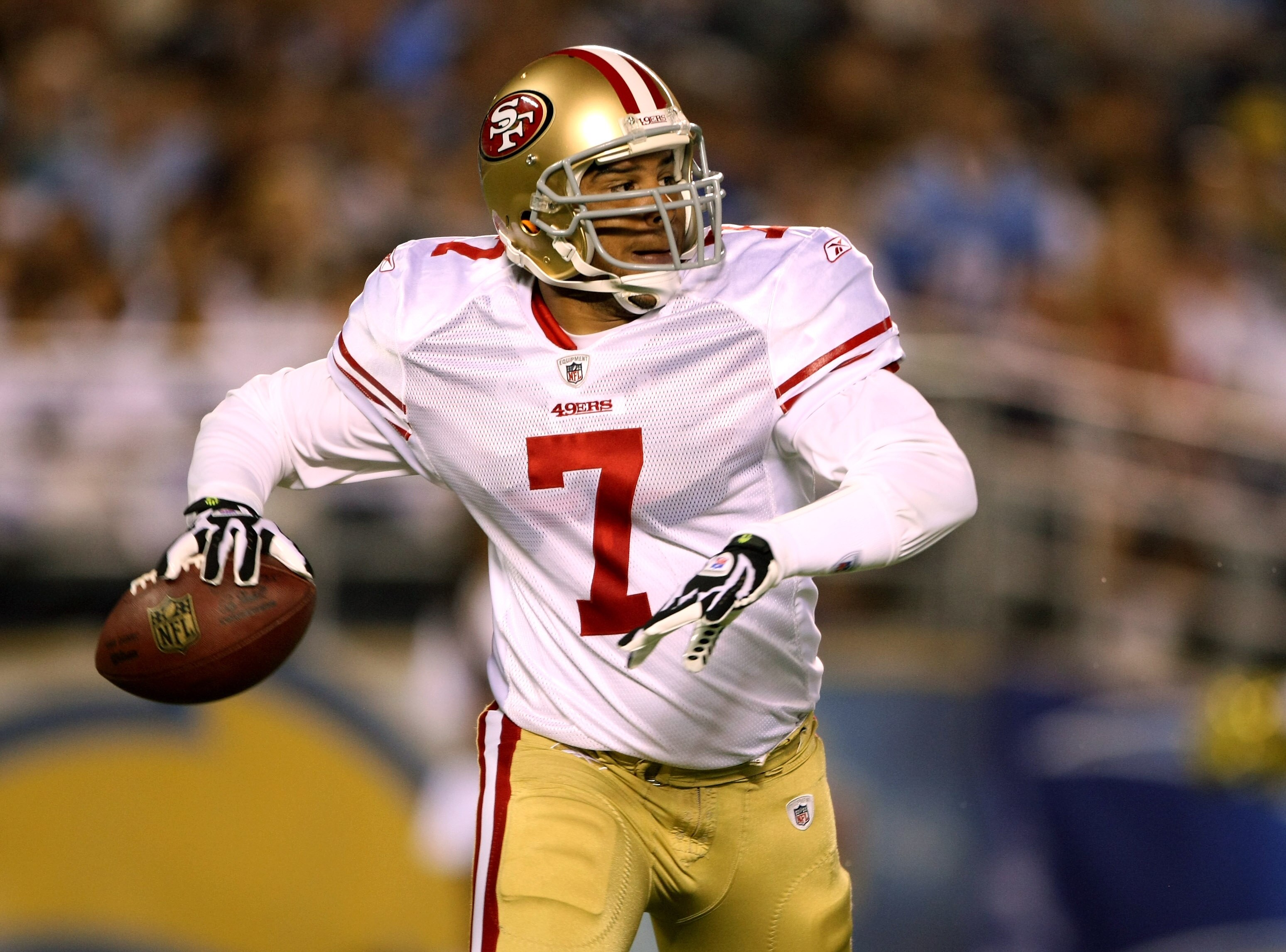 SAN DIEGO - SEPTEMBER 4:   Quarterback Nate Davis #7 of the San Francisco 49ers scrambles with the ball against the San Diego Chargers on September 4, 2009 at Qualcomm Stadium in San Diego, California.    (Photo by Stephen Dunn/Getty Images)