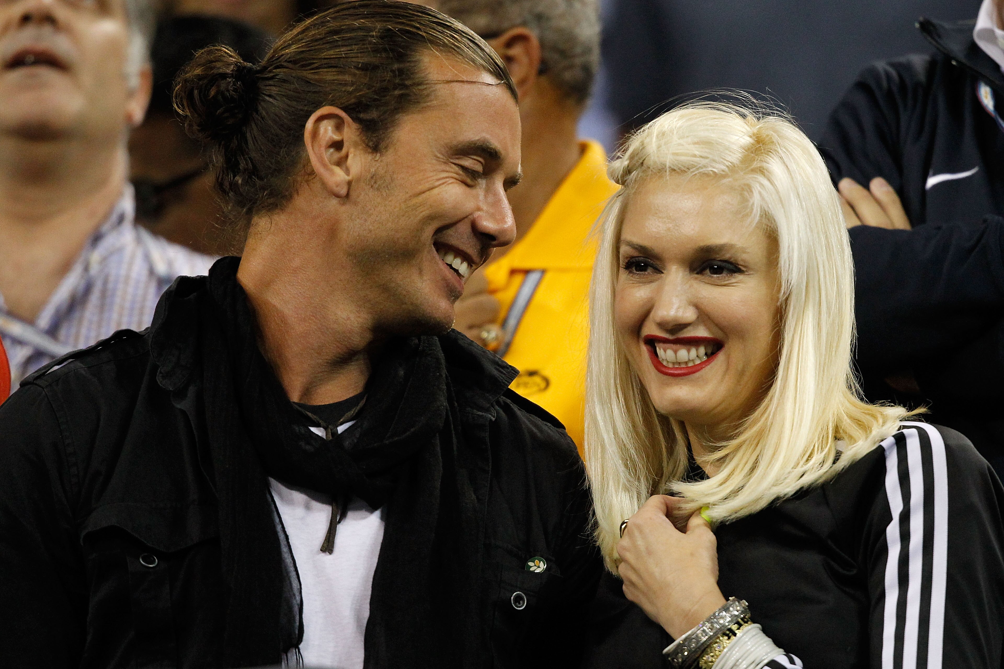 NEW YORK - SEPTEMBER 06:  (L-R) Singer Gavin Rossdale and singer Gwen Stefani attend the men's singles match between Roger Federer of Switzerland and Jurgen Melzer of Austria during day eight of the 2010 U.S. Open at the USTA Billie Jean King National Ten