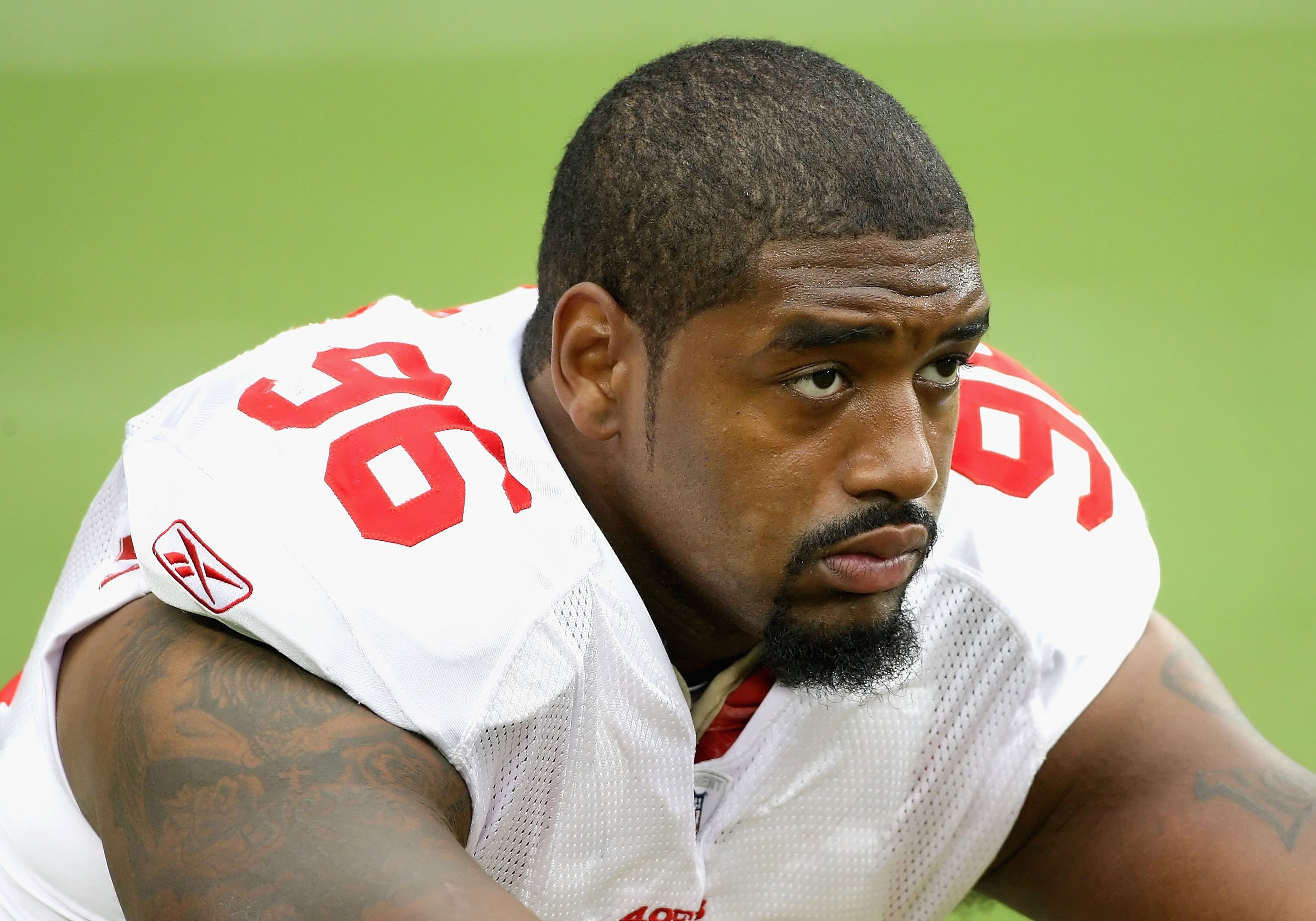 GLENDALE, AZ - SEPTEMBER 13:  Defensive end Kentwan Balmer #96 of the San Francisco 49ers warms up before the NFL game against the Arizona Cardinals at the Universtity of Phoenix Stadium on September 13, 2009 in Glendale, Arizona.  The 49ers defeated the