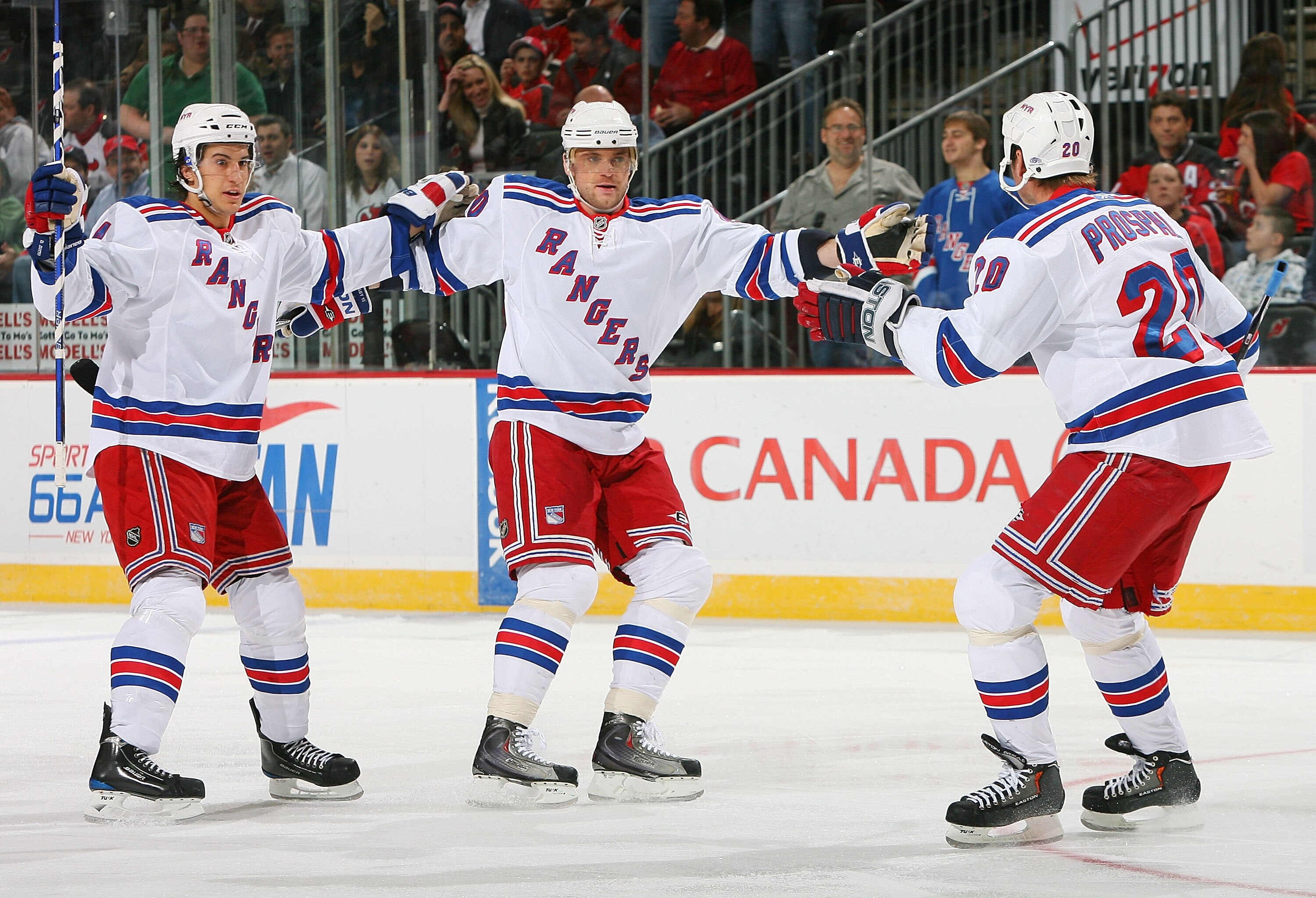 NEWARK, NJ - JANUARY 10:  Vinny Prospal #20 of the New York Rangers celebrates his first-period goal with teammates Marian Gaborik #10 and Michael del Zotto #4 during NHL action against the New Jersey Devils at the Prudential Center on March 10, 2010 in N