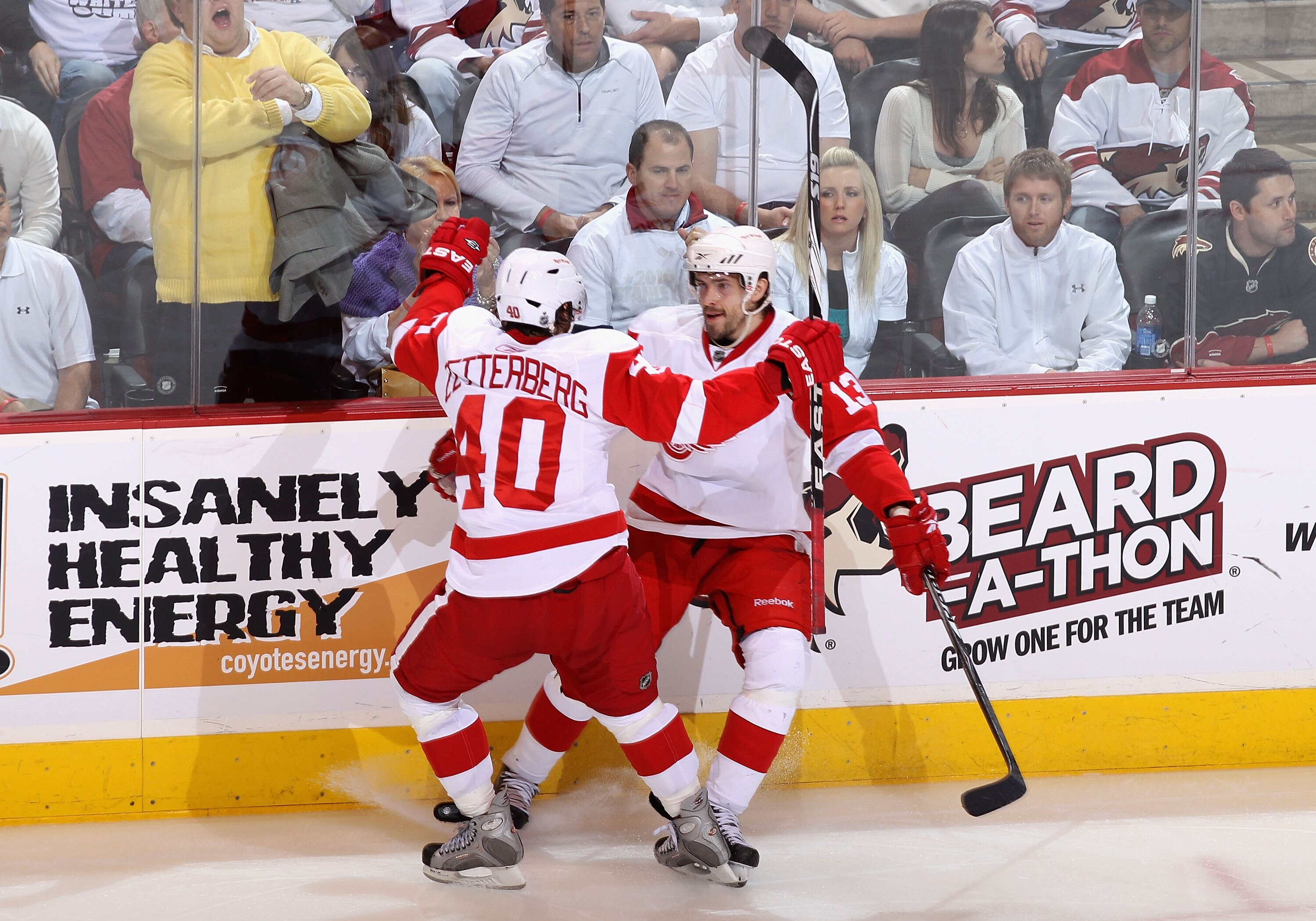GLENDALE, AZ - APRIL 27:  Pavel Datsyuk #13 of the Detroit Red Wings celebrates with teammate Henrik Zetterberg #40 after Datsyuk scored a second period goal against the Phoenix Coyotes in Game Seven of the Western Conference Quarterfinals during the 2010