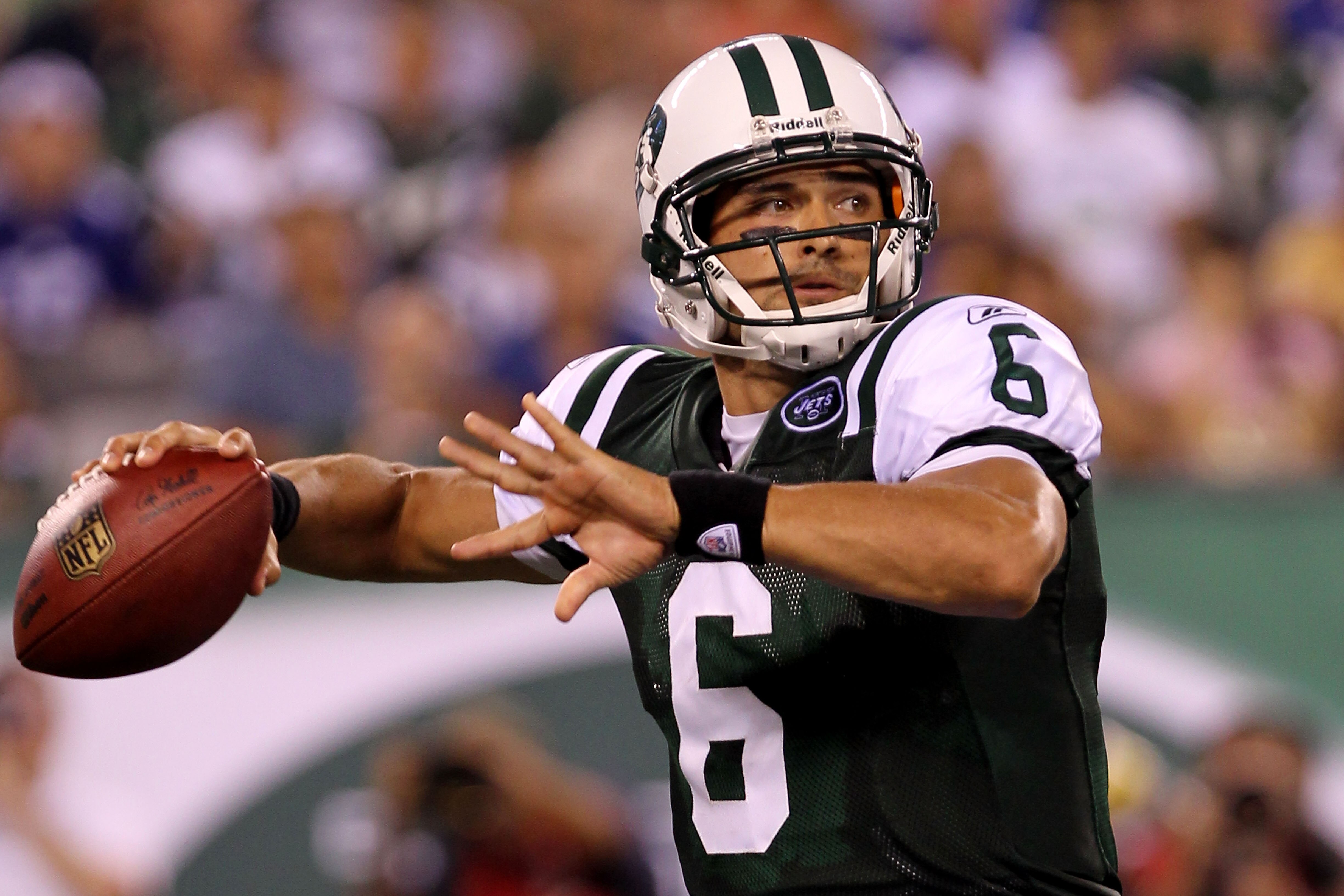 EAST RUTHERFORD, NJ - AUGUST 16:  Quarterback Mark Sanchez #6 of the New York Jets passes against the New York Giants during their game at New Meadowlands Stadium on August 16, 2010 in East Rutherford, New Jersey.  (Photo by Nick Laham/Getty Images)