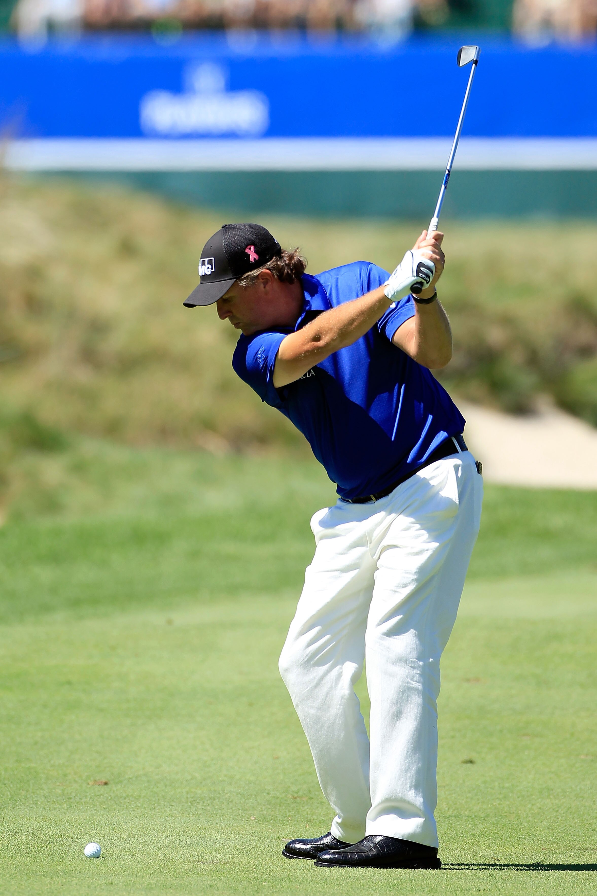 NORTON, MA - SEPTEMBER 04:  Phil Mickelson hits a shot on the ninth hole during the second round of the Deutsche Bank Championship at TPC Boston on September 4, 2010 in Norton, Massachusetts.  (Photo by Michael Cohen/Getty Images)