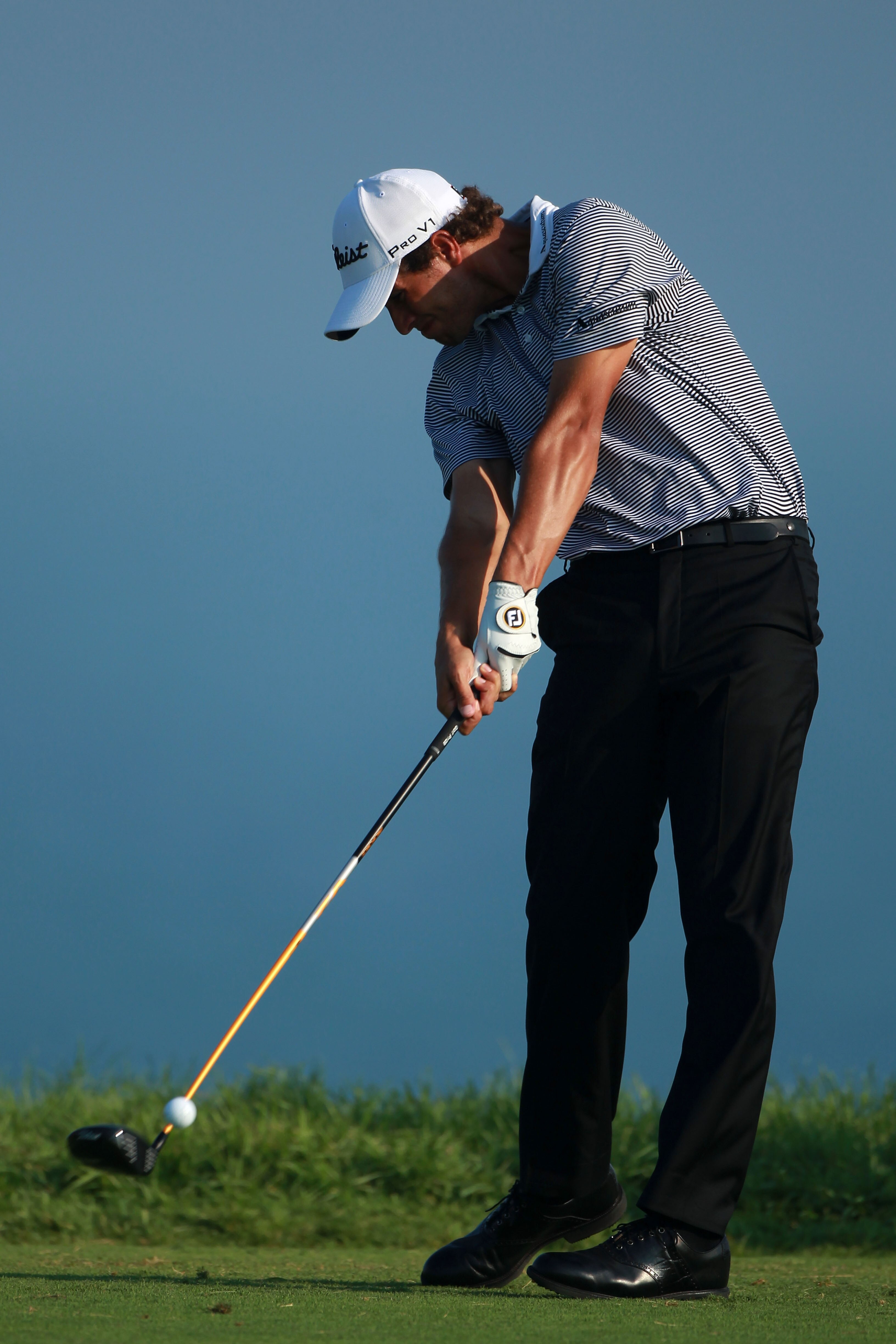 KOHLER, WI - AUGUST 12:  Adam Scott of Australia hits his tee shot on the fifth hole during the first round of the 92nd PGA Championship on the Straits Course at Whistling Straits on August 12, 2010 in Kohler, Wisconsin.  (Photo by Andrew Redington/Getty