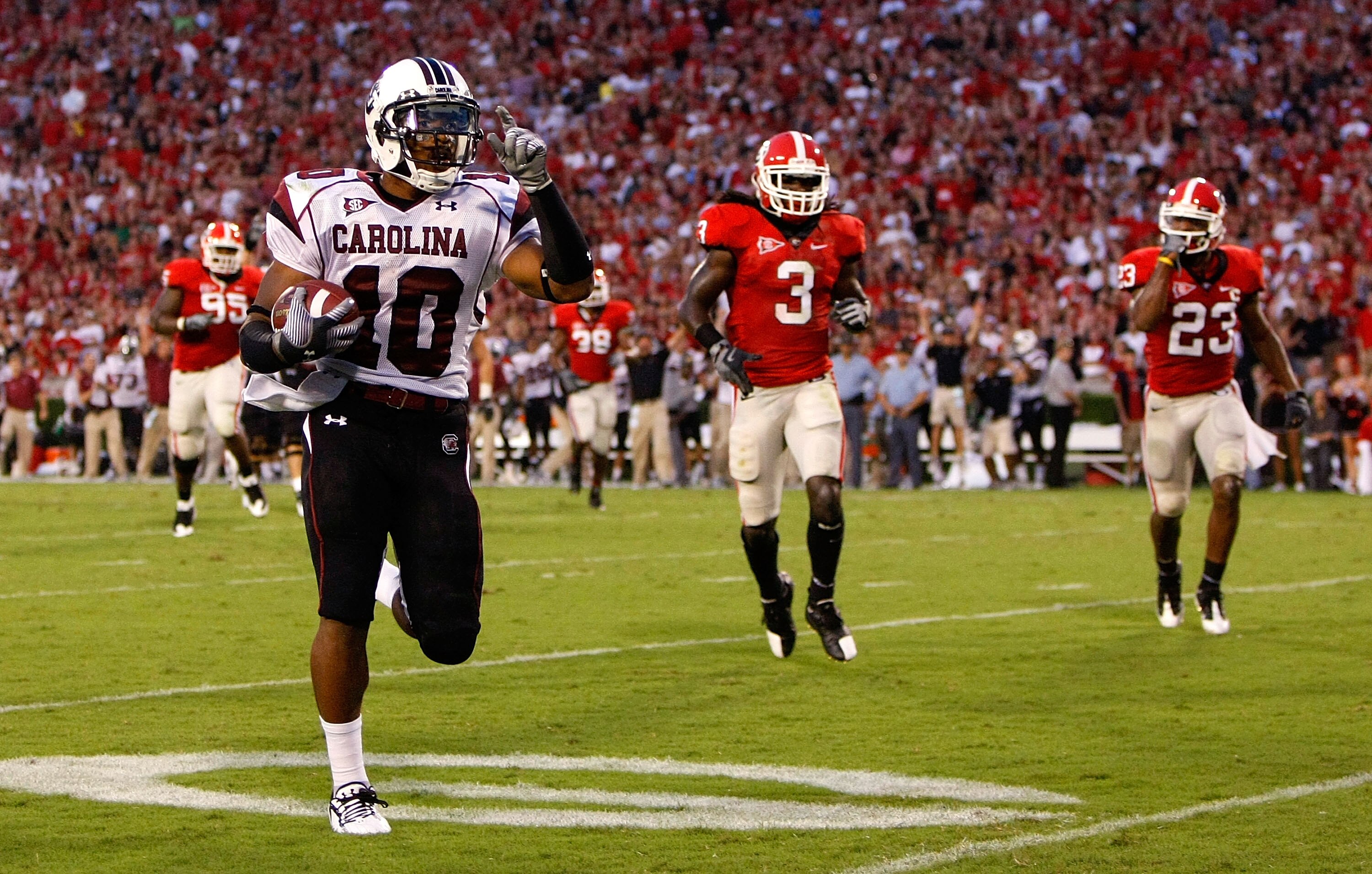 ATHENS, GA - SEPTEMBER 12:  Tailback Brian Maddox #10 of the South Carolina Gamecocks rushes in a touchdown against the Georgia Bulldogs at Sanford Stadium on September 12, 2009 in Athens, Georgia.  (Photo by Kevin C. Cox/Getty Images)