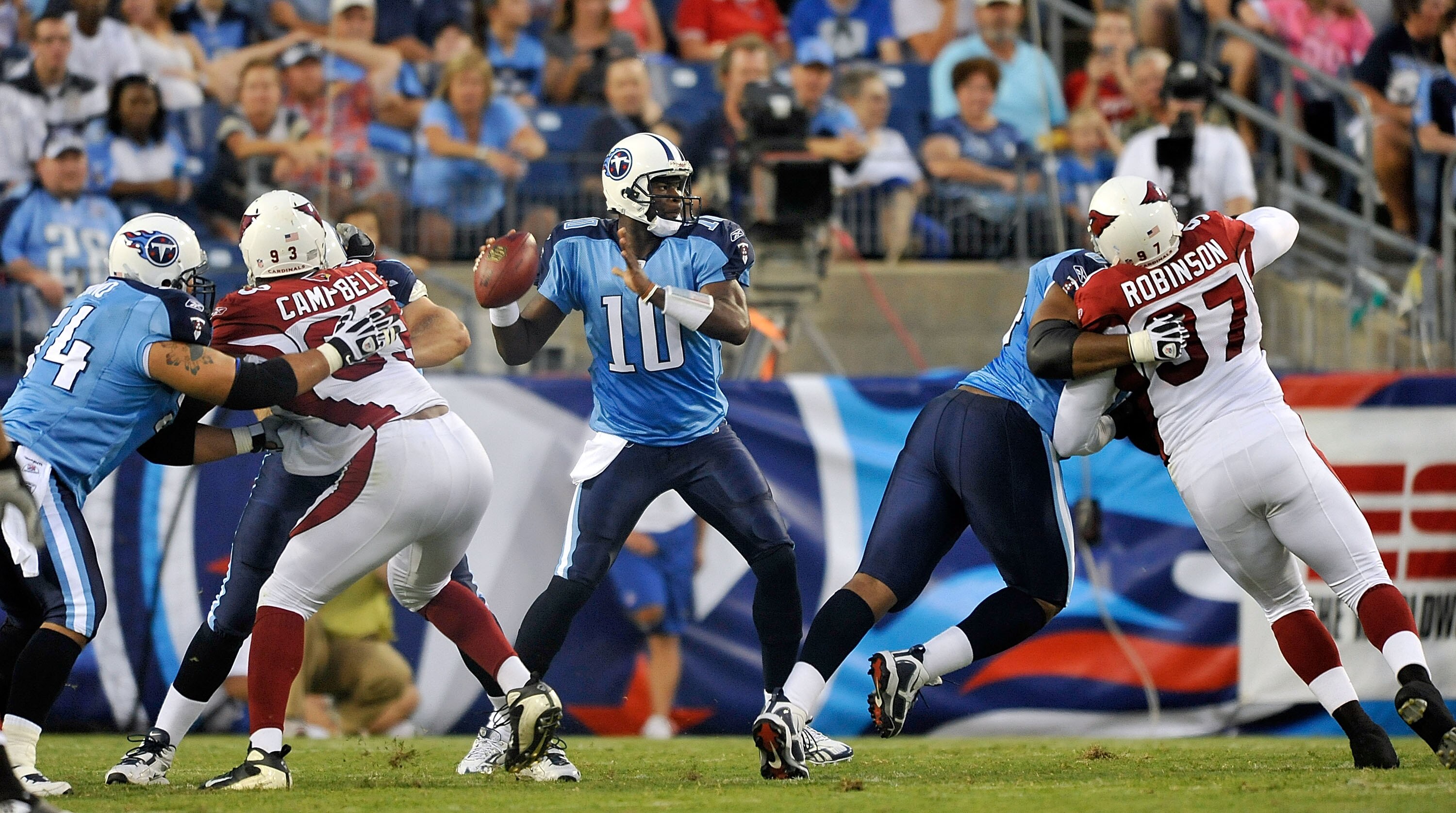 NASHVILLE, TN - AUGUST 23:  Quarterback Vince Young #10 of the Tennessee Titans drops back in the pocket against the Arizona Cardinals during a preseason game at LP Field on August 23, 2010 in Nashville, Tennessee. Tennessee defeated Arizona, 24-10.  (Pho