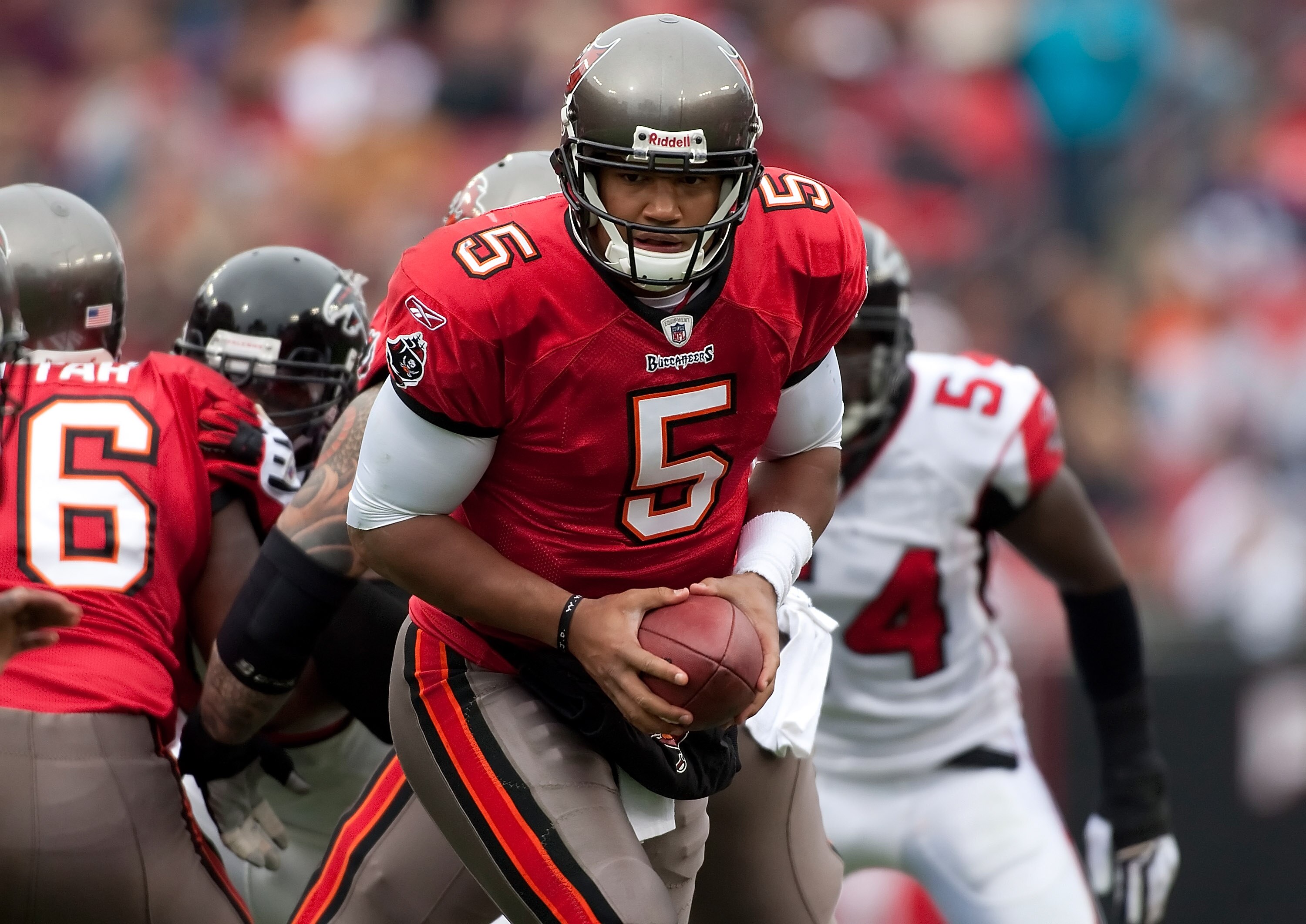 TAMPA, FL - JANUARY 03:  Quarterback Josh Freeman #5 of the Tampa Bay Buccaneers hands the ball off against the Atlanta Falcons during the game at Raymond James Stadium on January 3, 2010 in Tampa, Florida.  (Photo by J. Meric/Getty Images)