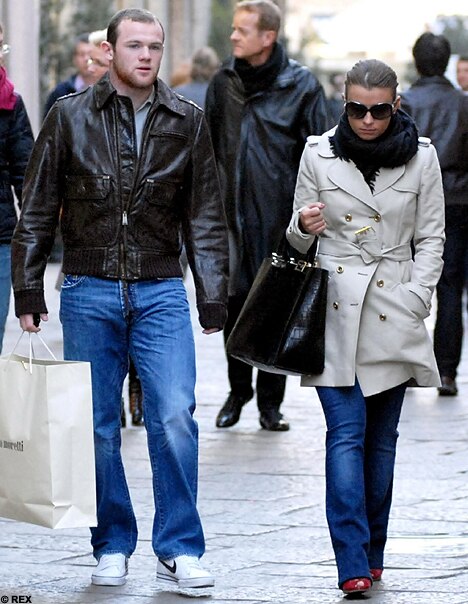 Coleen Rooney in the street ahead of Wayne (Picture)