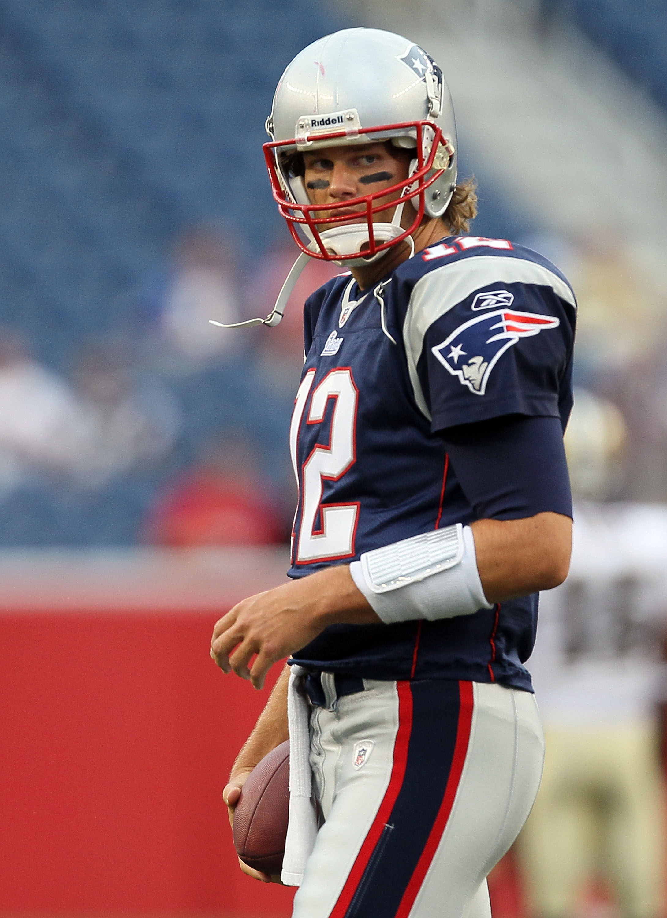 FOXBORO, MA - AUGUST 12: Tom Brady # 12 of the New England Patriots looks on before the preseason game against the New Orleans Saints at Gillette Stadium on August 12, 2010 in Foxboro. Massachusetts. (Photo by Jim Rogash/Getty Images)
