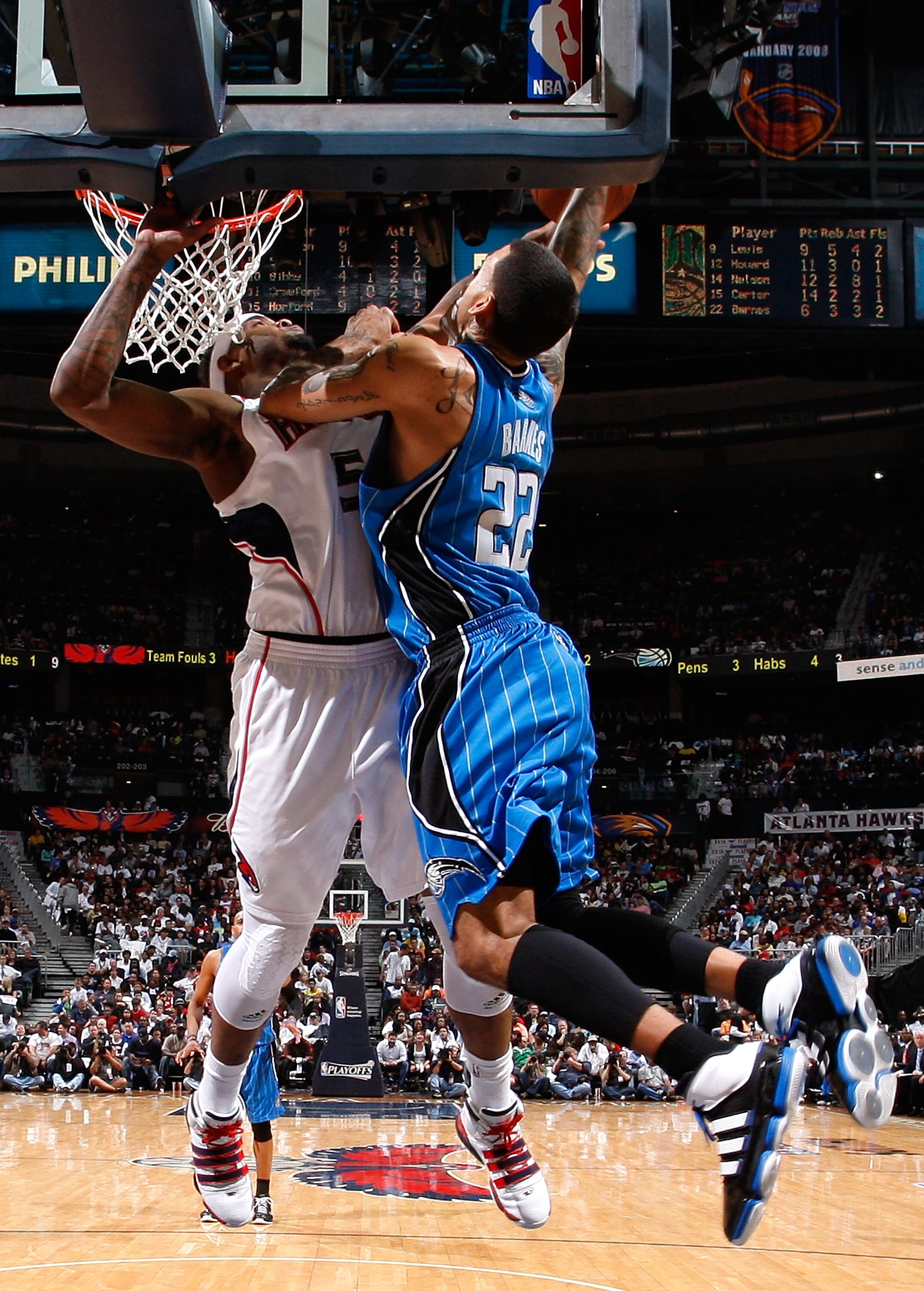 ATLANTA - MAY 10: Josh Smith #5 of the Atlanta Hawks blocks a dunk by Matt Barnes #22 of the Orlando Magic during Game Four of the Eastern Conference Semifinals of the 2010 NBA Playoffs at Philips Arena on May 10, 2010 in Atlanta, Georgia. NOTE TO USER: ATLANTA - MAY 10: Josh Smith #5 of the Atlanta Hawks blocks a dunk by Matt Barnes #22 of the Orlando Magic during Game Four of the Eastern Conference Semifinals of the 2010 NBA Playoffs at Philips Arena on May 10, 2010 in Atlanta, Georgia. NOTE TO USER: