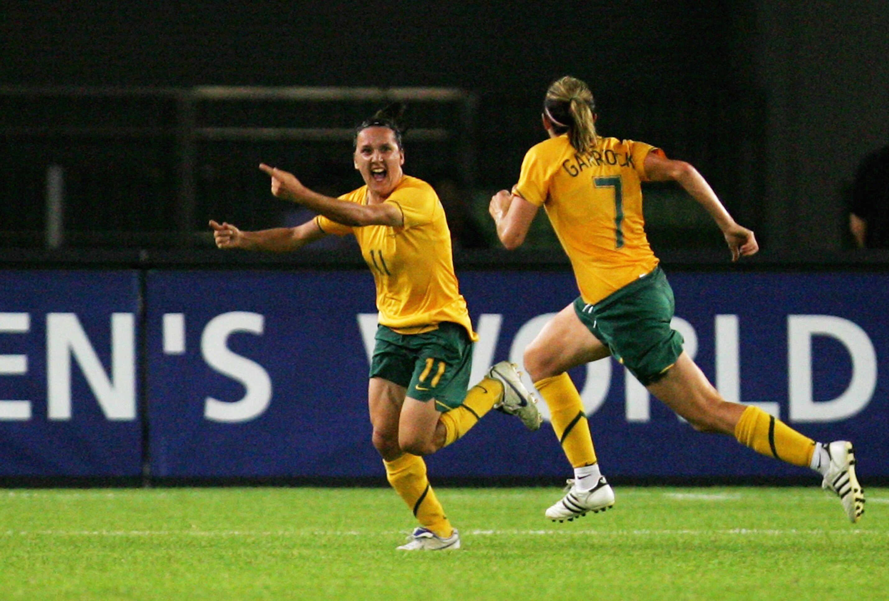 HANGZHOU, ZHEJIANG - SEPTEMBER 15:  Lisa De Vanna (L) of Australia celebrates a goal against Norway during the FIFA Women's World Cup 2007 Group C match between Australia and Norway at Hangzhou Dragon Stadium on September 15, 2007 in Hangzhou, Zhejiang pr