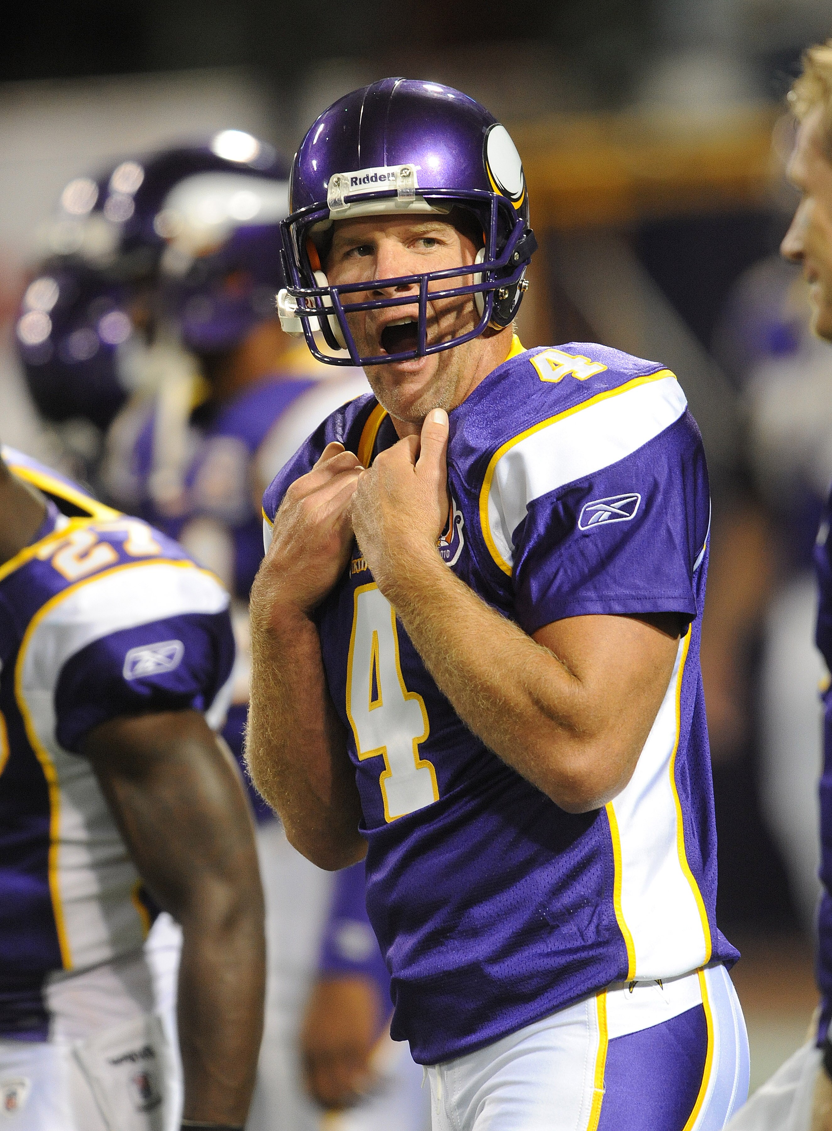MINNEAPOLIS - SEPTEMBER 02:  Brett Favre #4 of the Minnesota Vikings yawns during warmups prior to an NFL preseason game against the Denver Broncos at the Mall of America Field at Hubert H. Humphrey Metrodome, on September 2, 2010 in Minneapolis, Minnesot