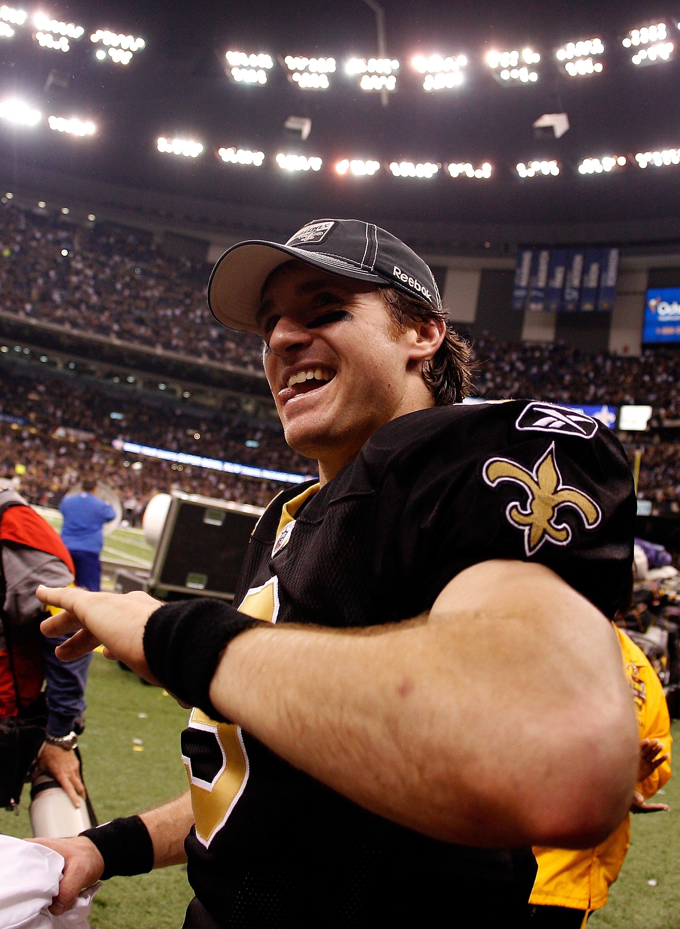 NEW ORLEANS - JANUARY 24:  Drew Brees #9 of the New Orleans Saints celebrates after the Saints won 31-28 in overtime against the Minnesota Vikings during the NFC Championship Game at the Louisiana Superdome on January 24, 2010 in New Orleans, Louisiana.