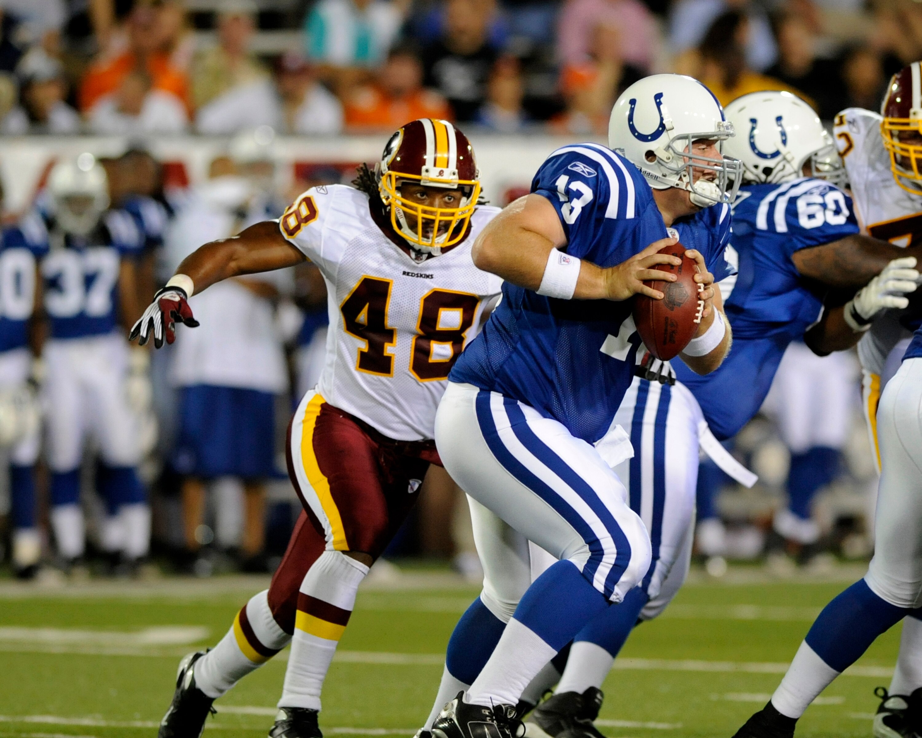 CANTON, OH - AUGUST 3:  Safety Chris Horton #48 of the Washington Redskins looks for a sack against the Indianapolis Colts in the Pro Football Hall of Fame Game at Fawcett Stadium on August 3, 2008 in Canton, Ohio.   (Photo by Al Messerschmidt/Getty Image