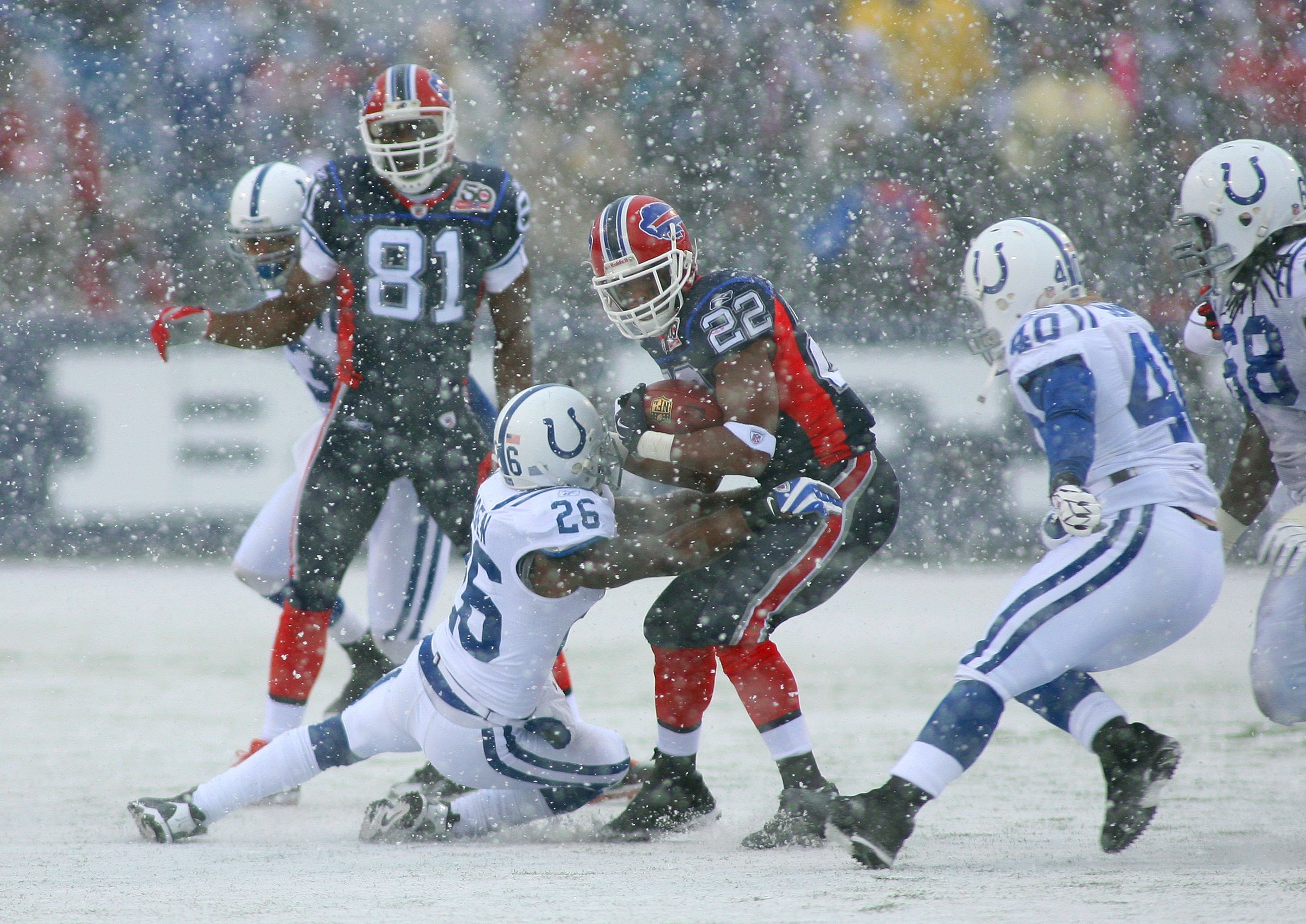 ORCHARD PARK, NY - JANUARY 3:  Kelvin Hayden #22  of the Indianapolis Colts tackles running back Fred Jackson #22 of the Buffalo Bills during their NFL game at Ralph Wilson Stadium on January 3, 2010 in Orchard Park, New York. The Bills defeated the Colts