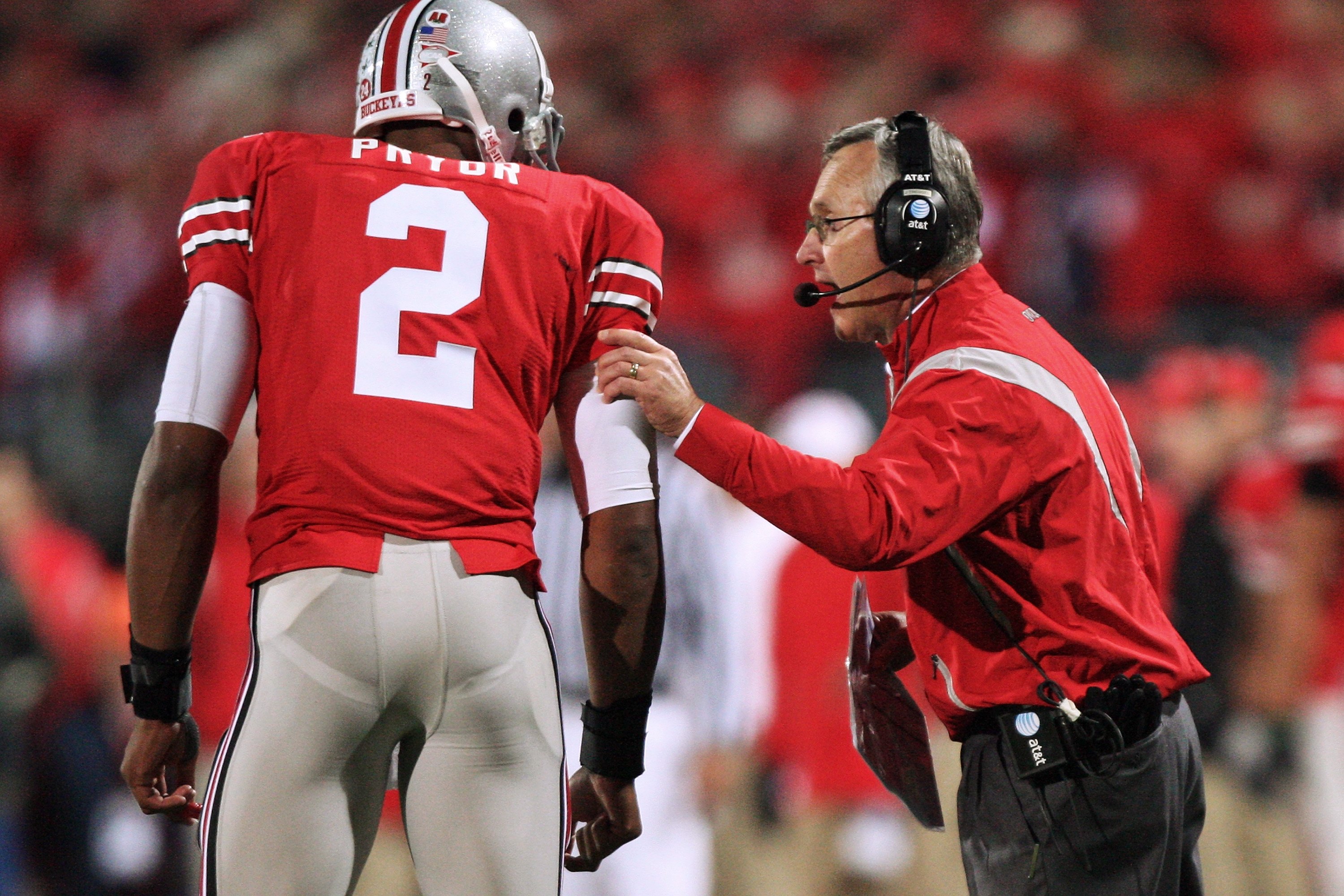 COLUMBUS, OH - OCTOBER 25: Ohio State Buckeyes head coach Jim Tressell instructs his quarterback Terrell Pryor #2 during the game against the Penn State Nittany Lions on October 25, 2008 at Ohio Stadium in Columbus, Ohio. (Photo by Jamie Sabau/Getty Imag COLUMBUS, OH - OCTOBER 25: Ohio State Buckeyes head coach Jim Tressell instructs his quarterback Terrell Pryor #2 during the game against the Penn State Nittany Lions on October 25, 2008 at Ohio Stadium in Columbus, Ohio. (Photo by Jamie Sabau/Getty Imag