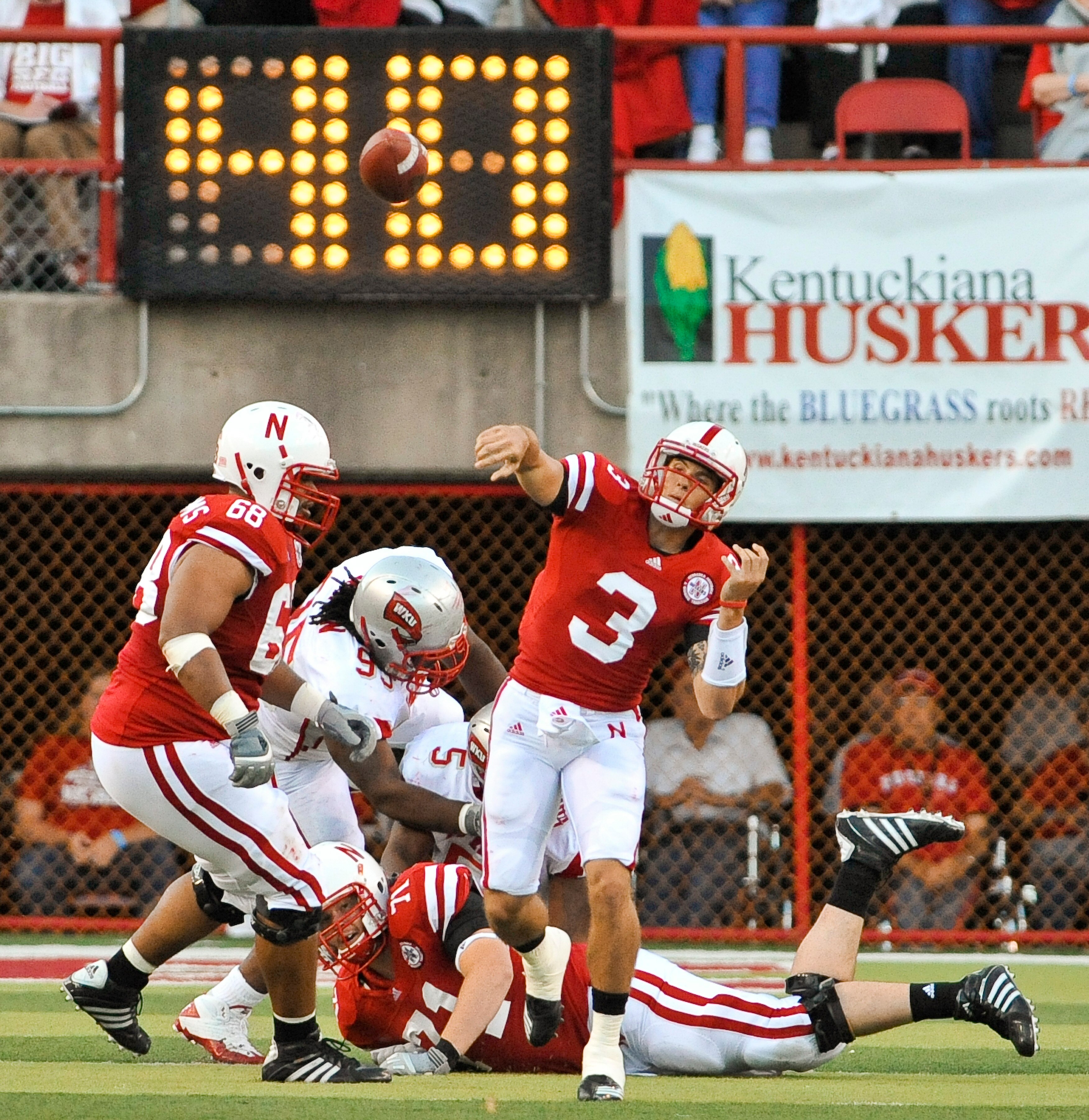 LINCOLN, NE - SEPTEMBER 04: Taylor Martinez #3 of the Nebraska Cornhuskers passes the ball down field against the Western Kentucky Hilltoppers during first half action of their game at Memorial Stadium on September 4, 2010 in Lincoln, Nebraska. Nebraska LINCOLN, NE - SEPTEMBER 04: Taylor Martinez #3 of the Nebraska Cornhuskers passes the ball down field against the Western Kentucky Hilltoppers during first half action of their game at Memorial Stadium on September 4, 2010 in Lincoln, Nebraska. Nebraska