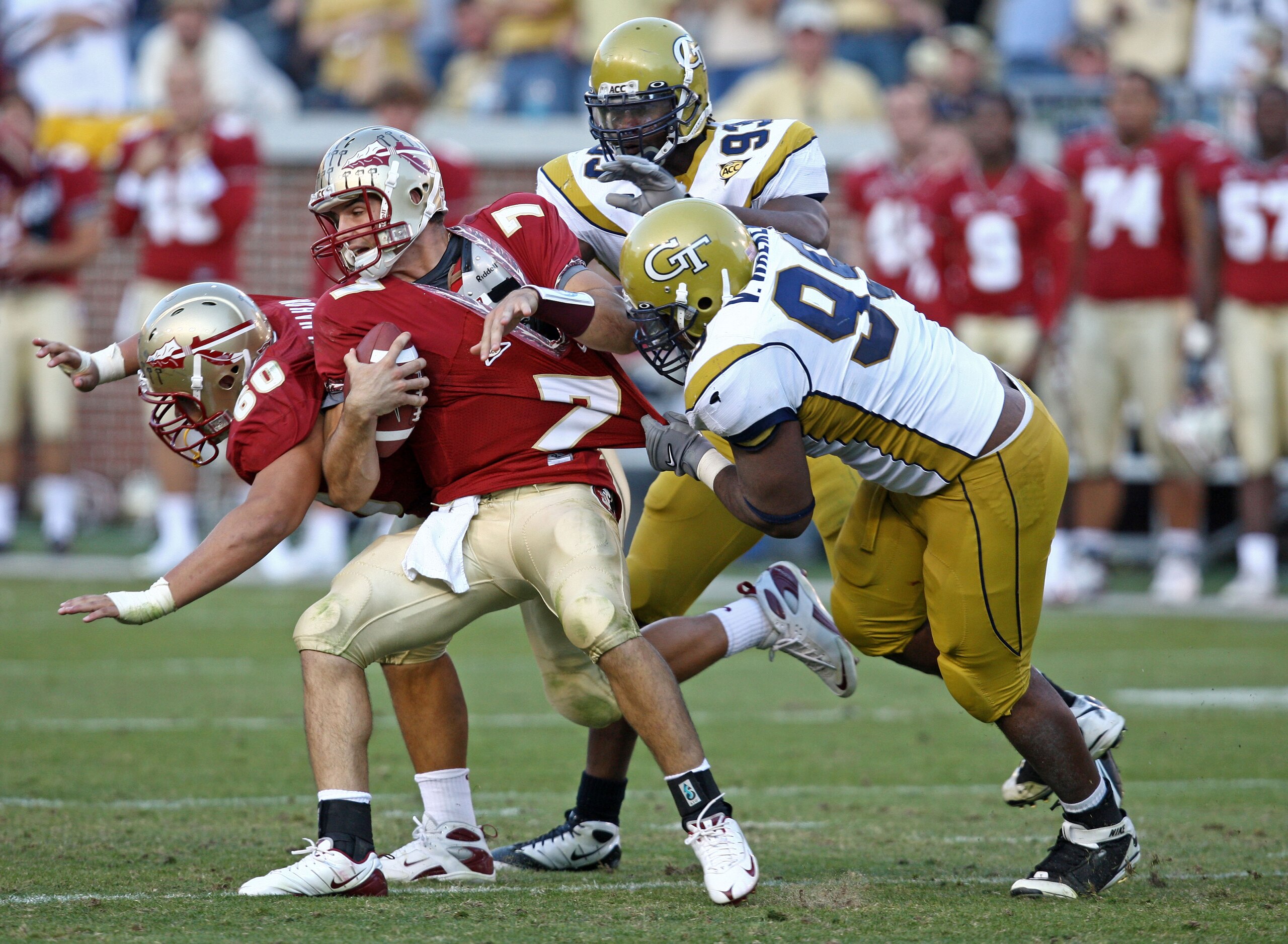 ATLANTA - NOVEMBER 1:  Defensive end Vance Walker #99 of the Georgia Tech Yellow Jackets tackles quarterback Christian Ponder #7 of the Florida State Seminoles during the game at Bobby Dodd Stadium at Historic Grant Field on November 1, 2008 in Atlanta, G