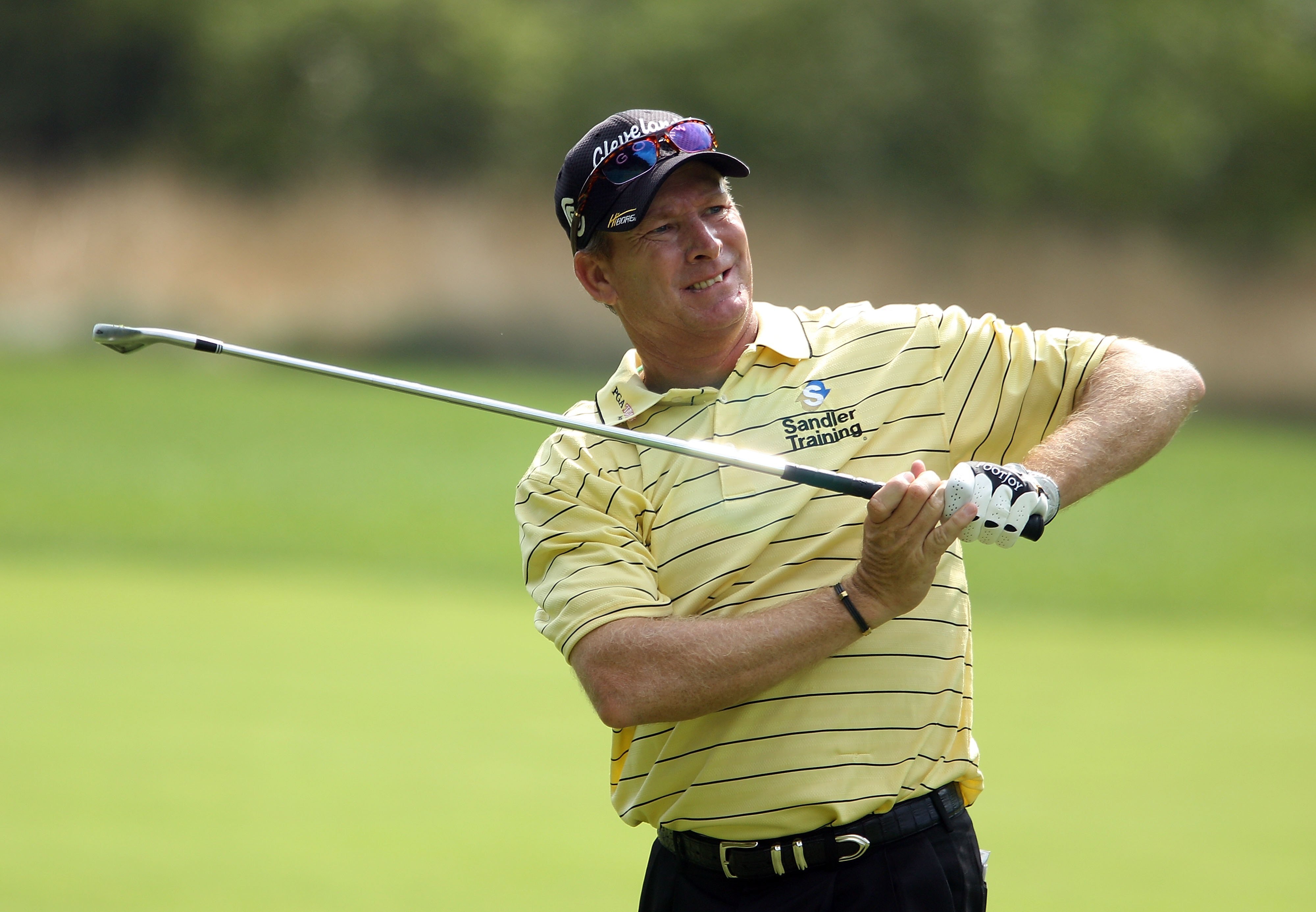 WHITE SULPHUR SPRINGS, WV - JULY 29:  Woody Austin watches a shot during the first round of the Greenbrier Classic on The Old White Course at the Greenbrier Resort on July 29, 2010 in White Sulphur Springs, West Virginia.  (Photo by Scott Halleran/Getty I