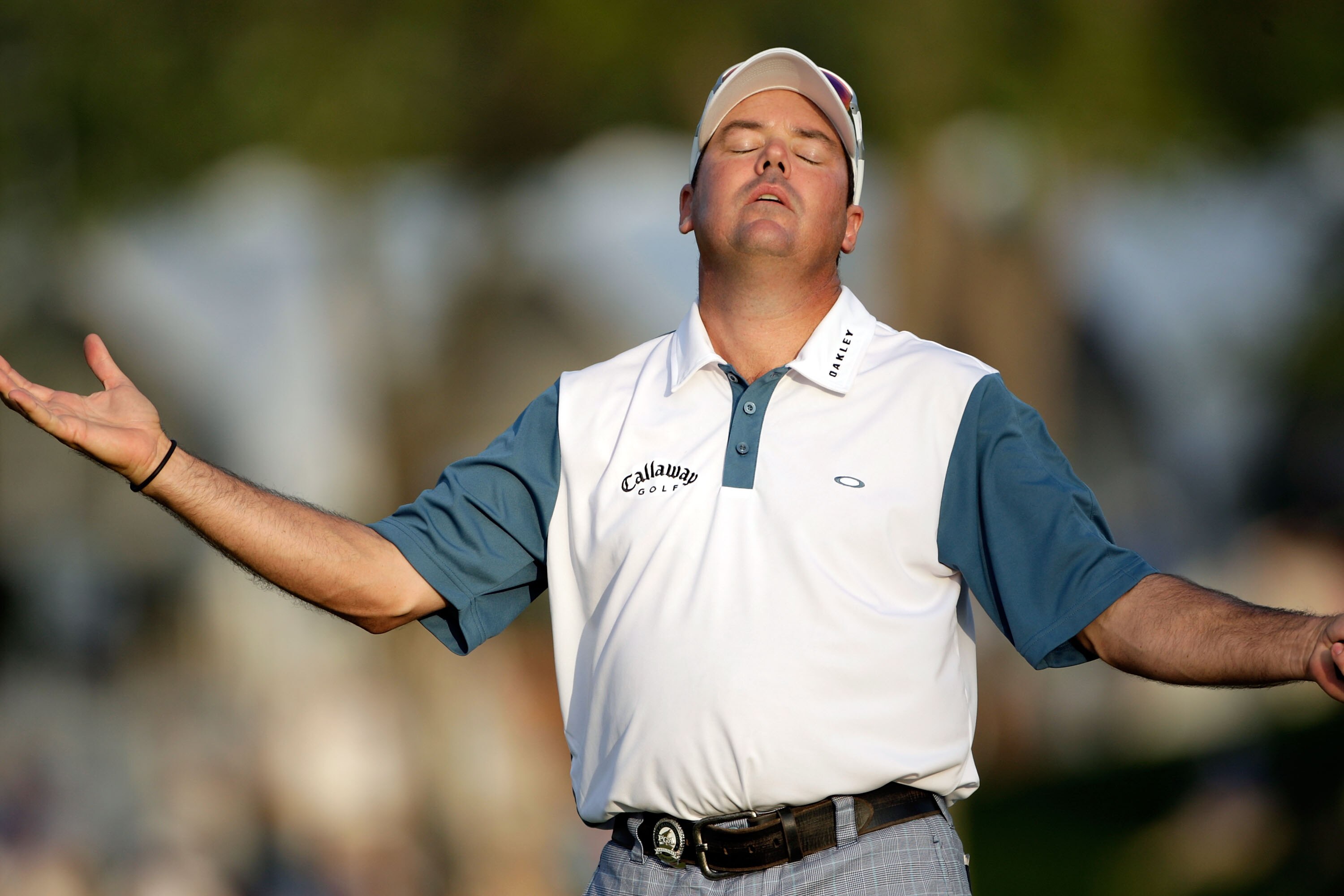 CHASKA, MN - AUGUST 14:  Rich Beem reacts to a putt on the 18th green during the second round of the 91st PGA Championship at Hazeltine National Golf Club on August 14, 2009 in Chaska, Minnesota.  (Photo by Jamie Squire/Getty Images)
