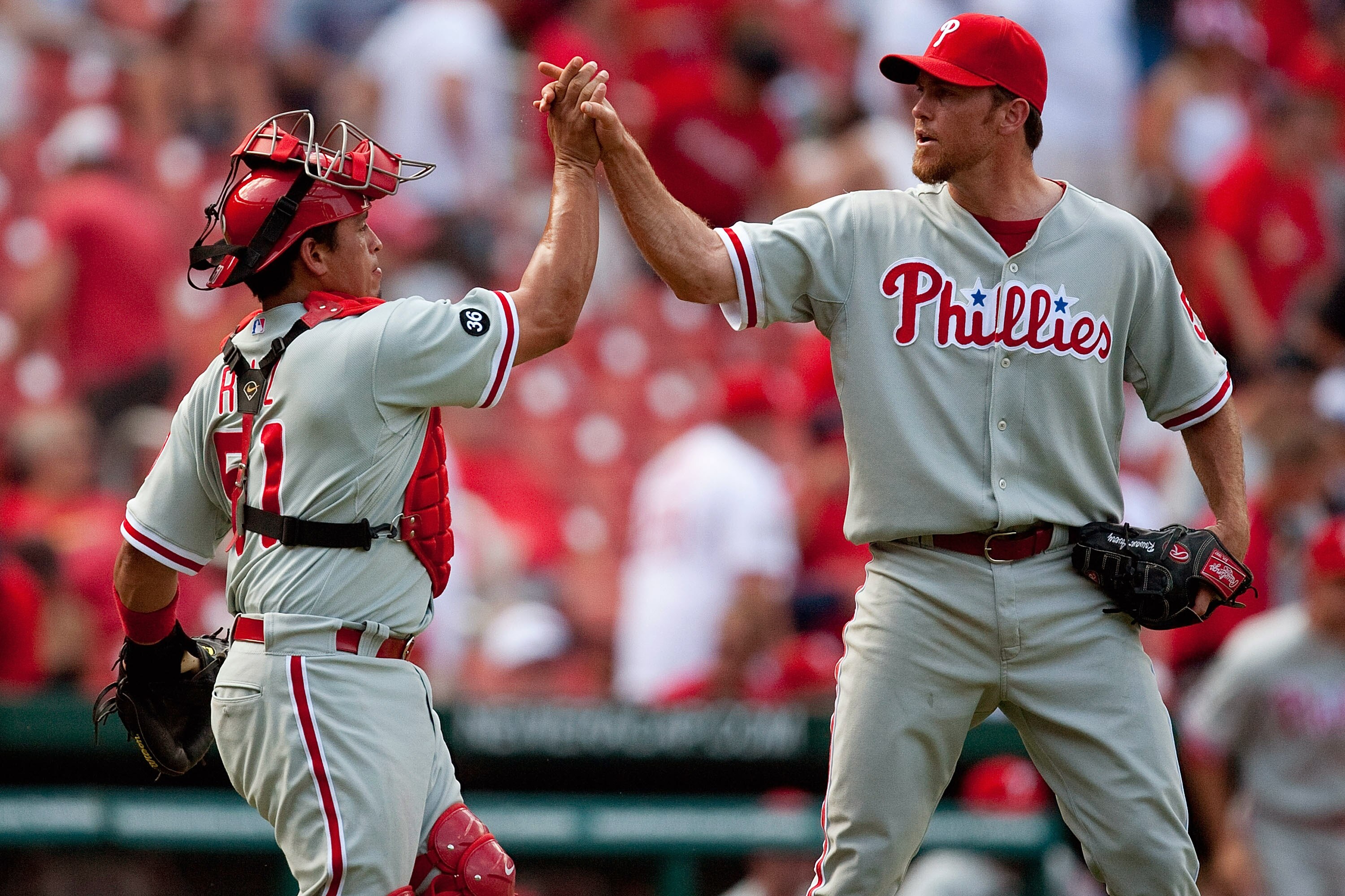 ST. LOUIS - JULY 22: Brad Lidge #54 and Carlos Ruiz #51 both of the Philadelphia Phillies congratulate each other after beating the St. Louis Cardinals at Busch Stadium on July 22, 2010 in St. Louis, Missouri. The Phillies defeated the Cardinals 2-0.  (Ph