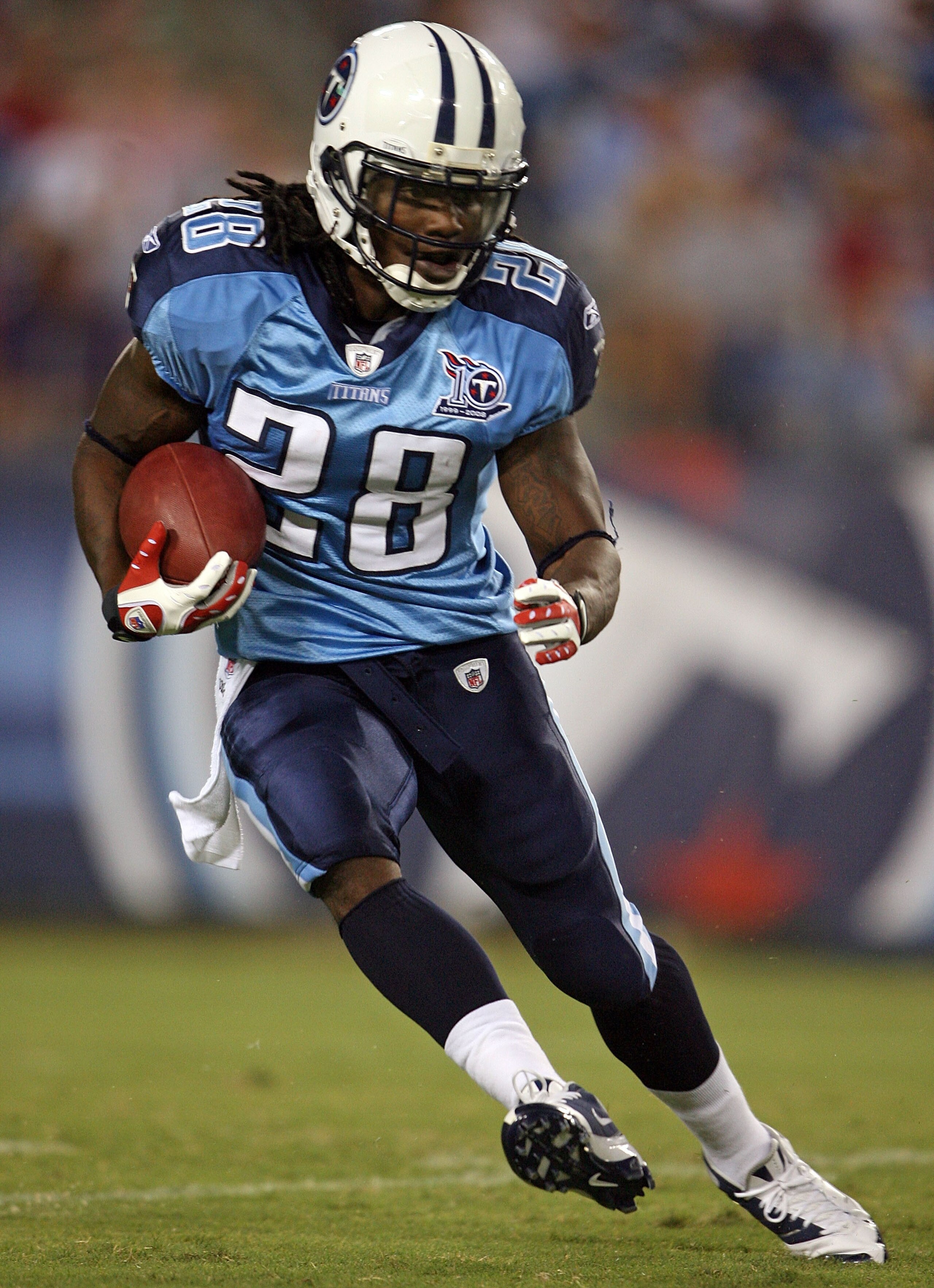 NASHVILLE, TN - AUGUST 15: Chris Johnson #28 of the Tennessee Titans runs with the ball during the NFL pre-season game against the Oakland Raiders at LP Field August 15, 2008 in Nashville, Tennessee. (Photo by Andy Lyons/Getty Images) NASHVILLE, TN - AUGUST 15: Chris Johnson #28 of the Tennessee Titans runs with the ball during the NFL pre-season game against the Oakland Raiders at LP Field August 15, 2008 in Nashville, Tennessee. (Photo by Andy Lyons/Getty Images)